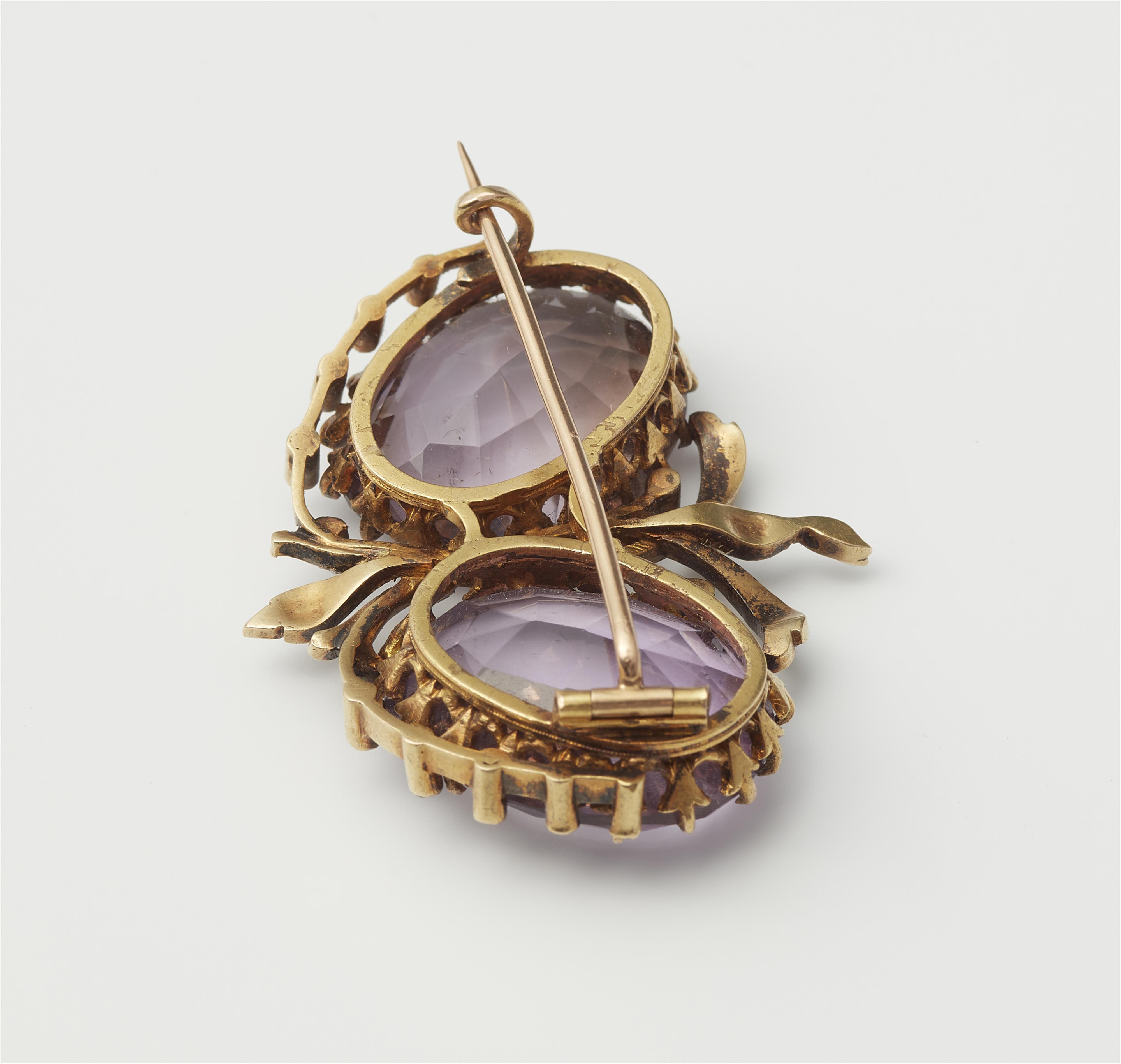 A late 19th century 14k gold, diamond and amethyst brooch. - image-2