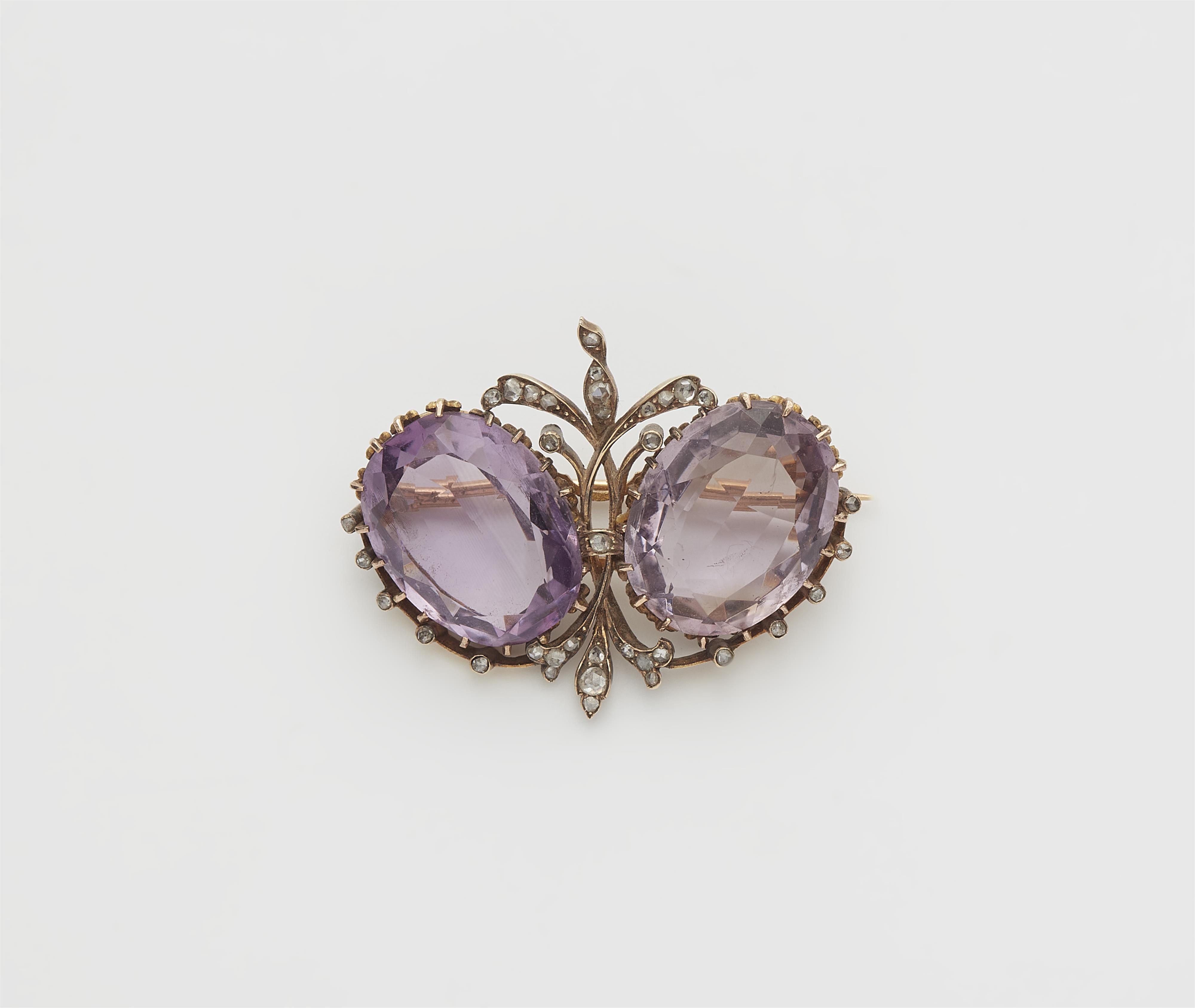 A late 19th century 14k gold, diamond and amethyst brooch. - image-1