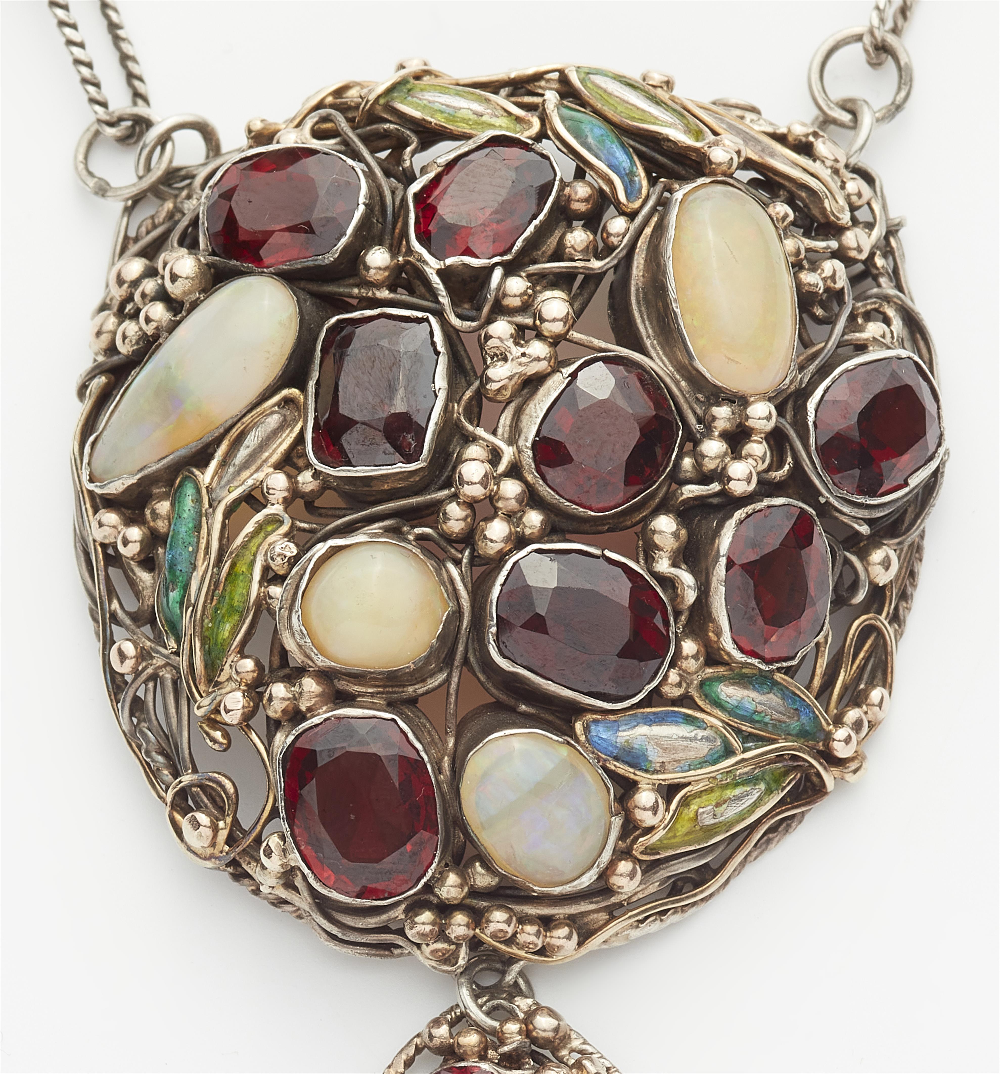 A rare silver gold granule and translucent enamel Arts and Crafts sautoir necklace set with opals, garnets and spinels in the manner of Dorrie Nossiter, ca. 1925. - image-2