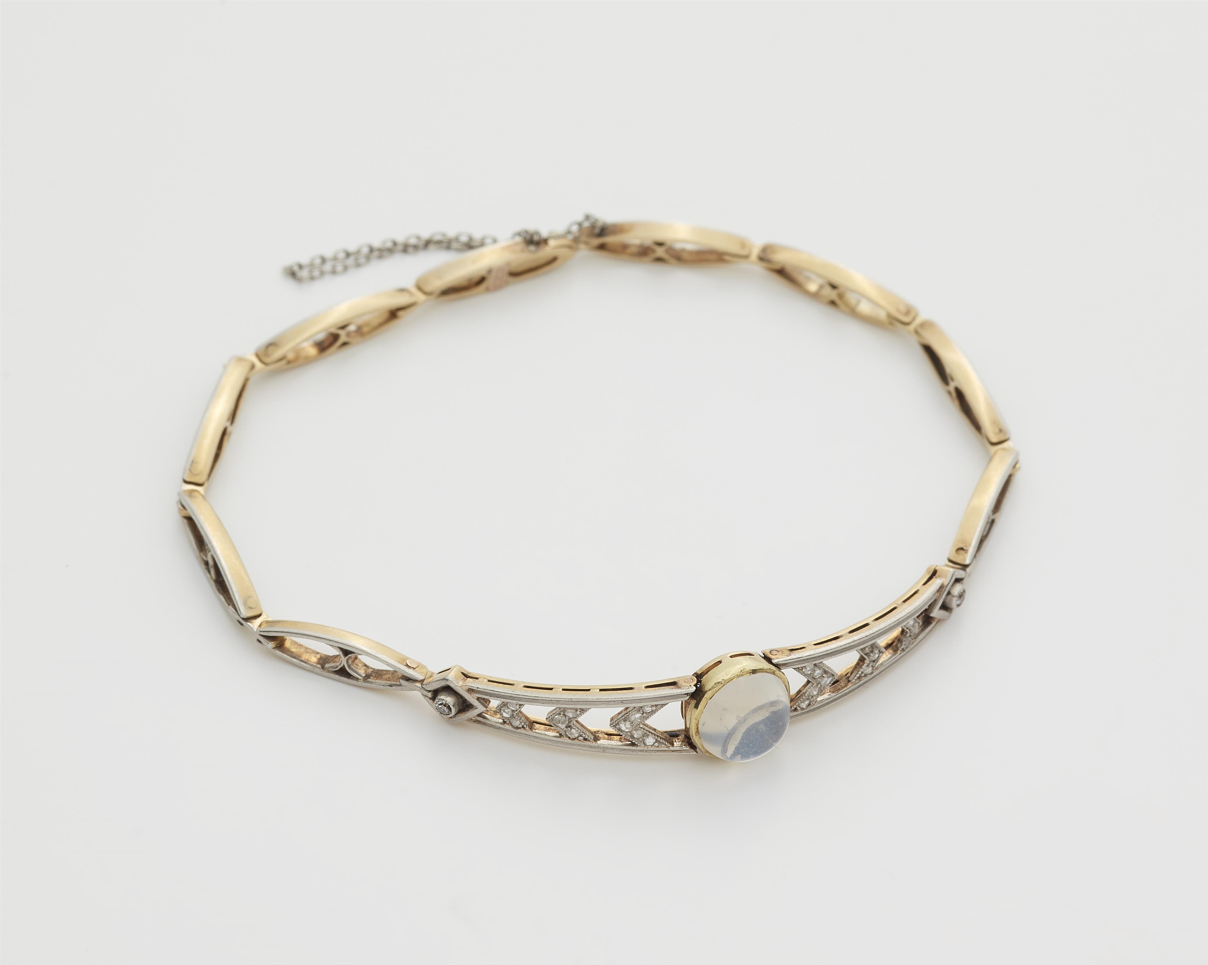 A delicate 14k gold platinum diamond and moonstone bracelet. - image-1