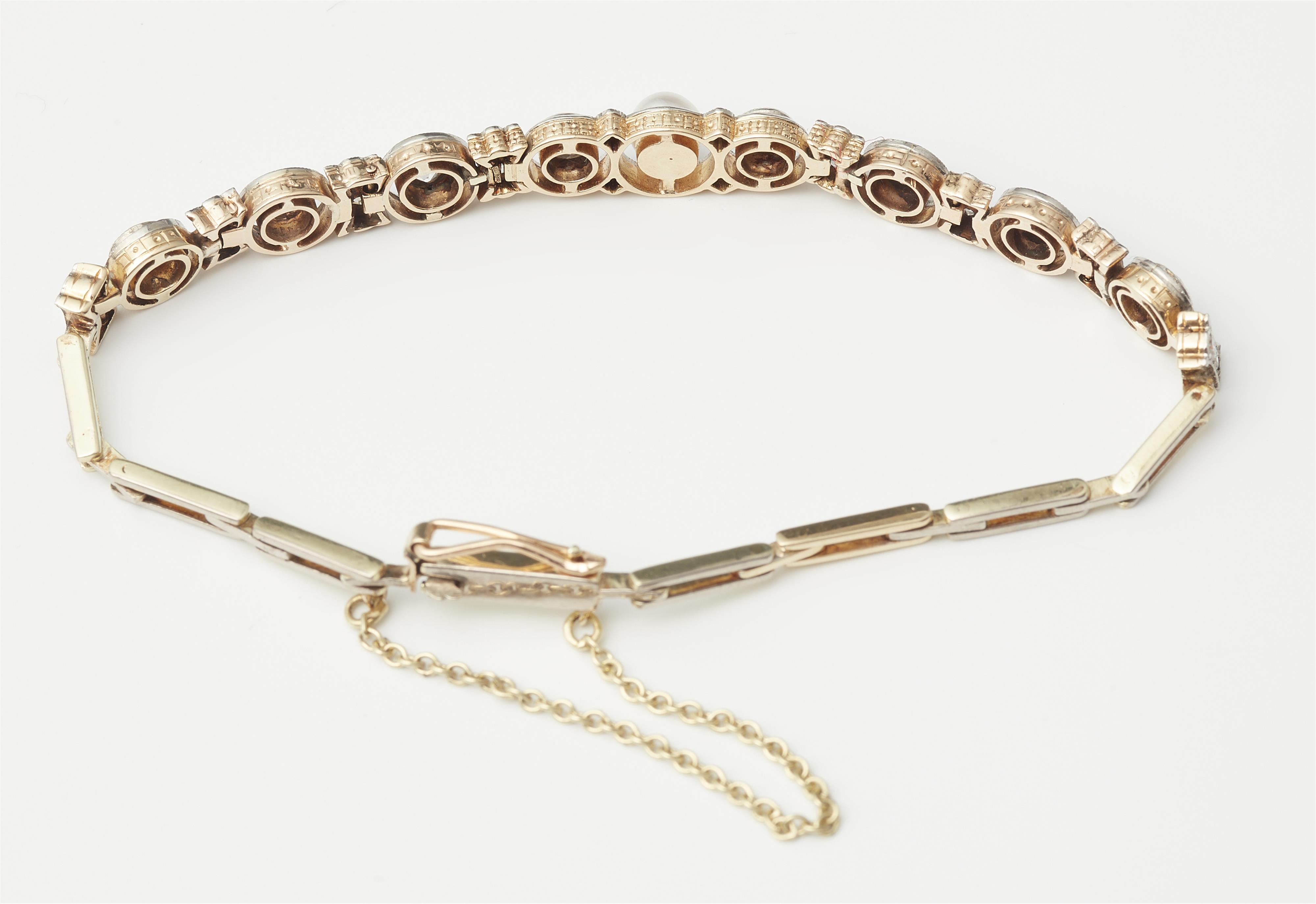 An 14k gold platinum diamond and pearl tennis bracelet. - image-2