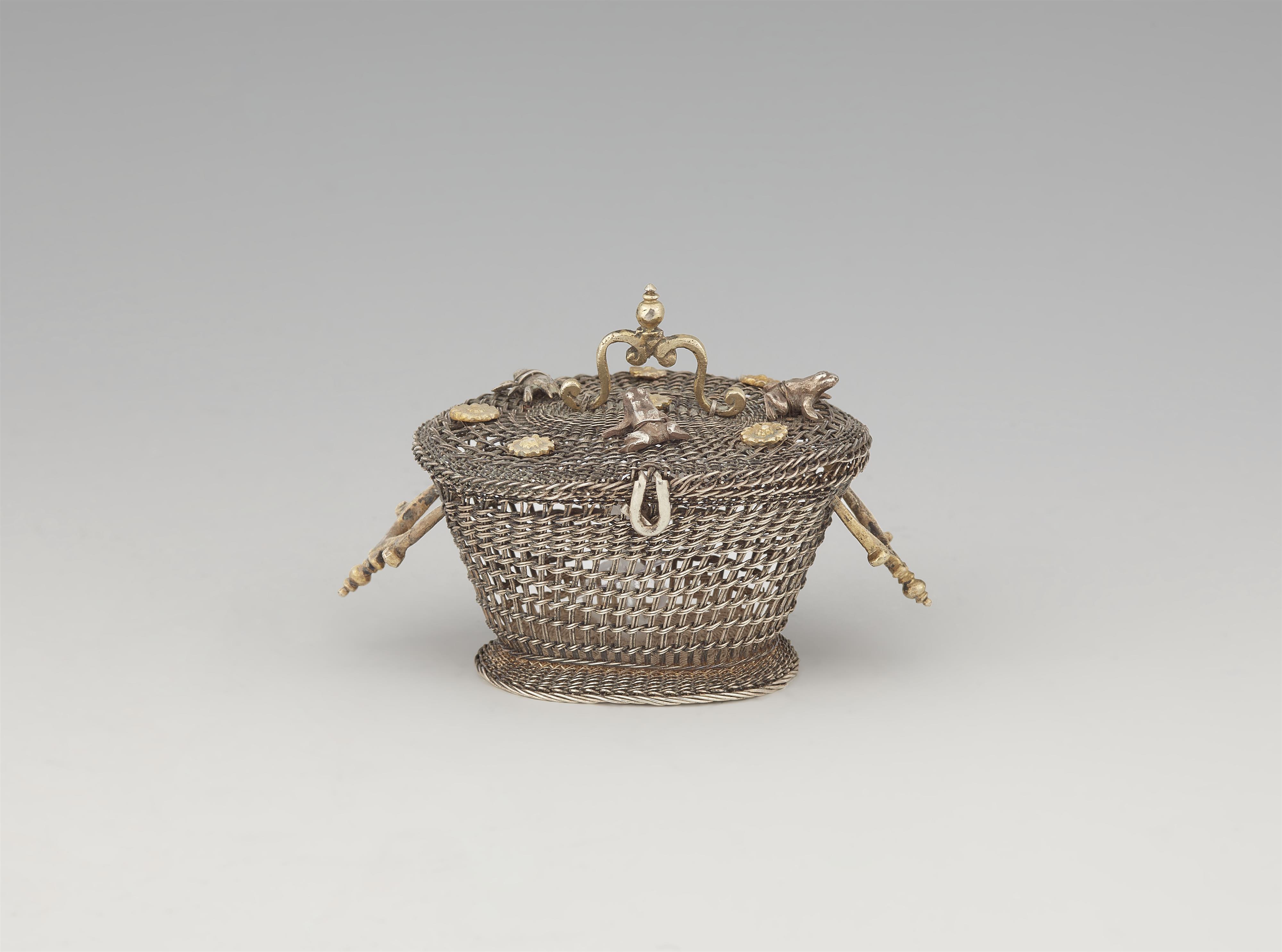 A parcel gilt Renaissance silver miniature basket - image-1