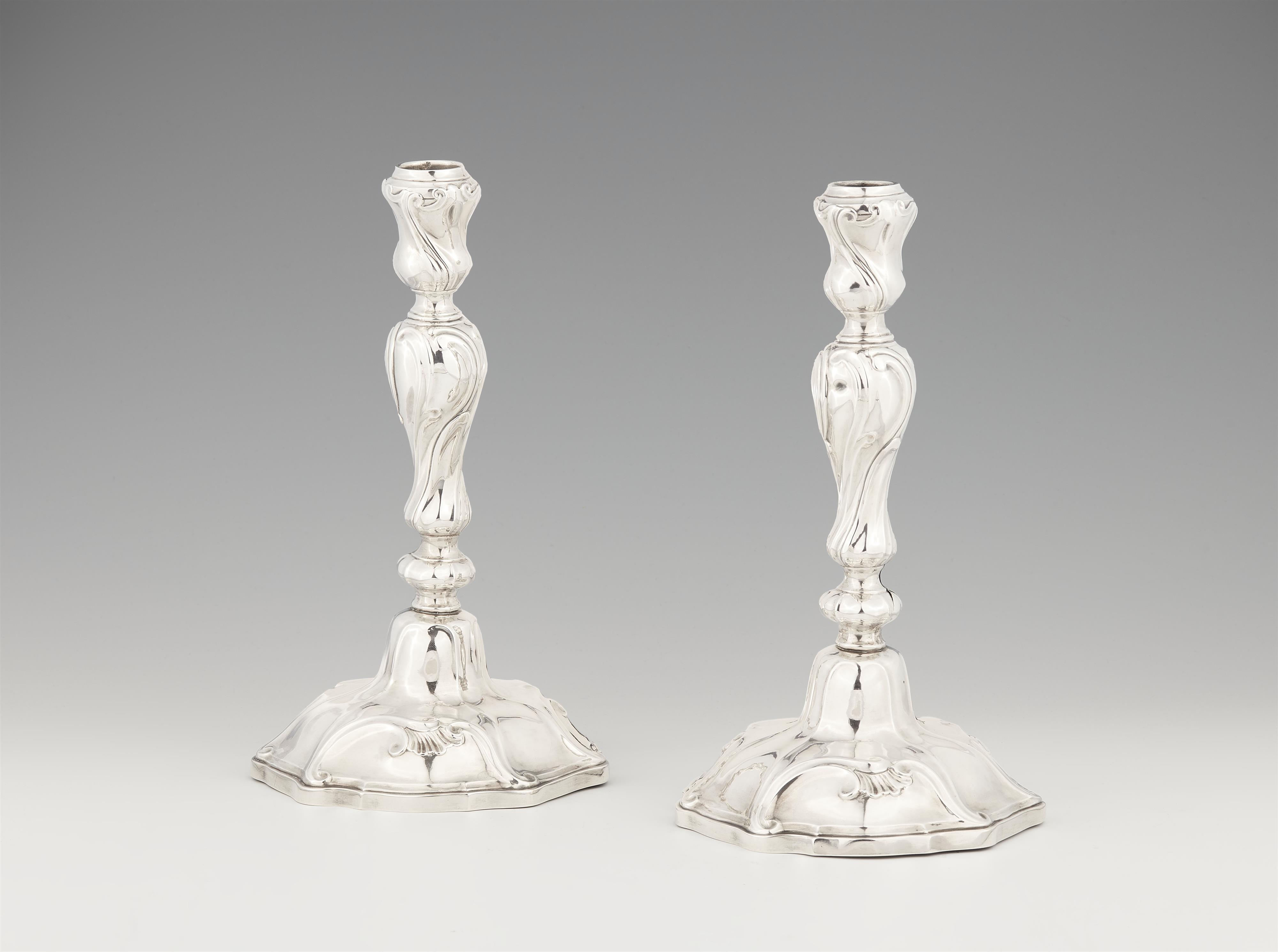 A pair of Mons silver candlesticks - image-1