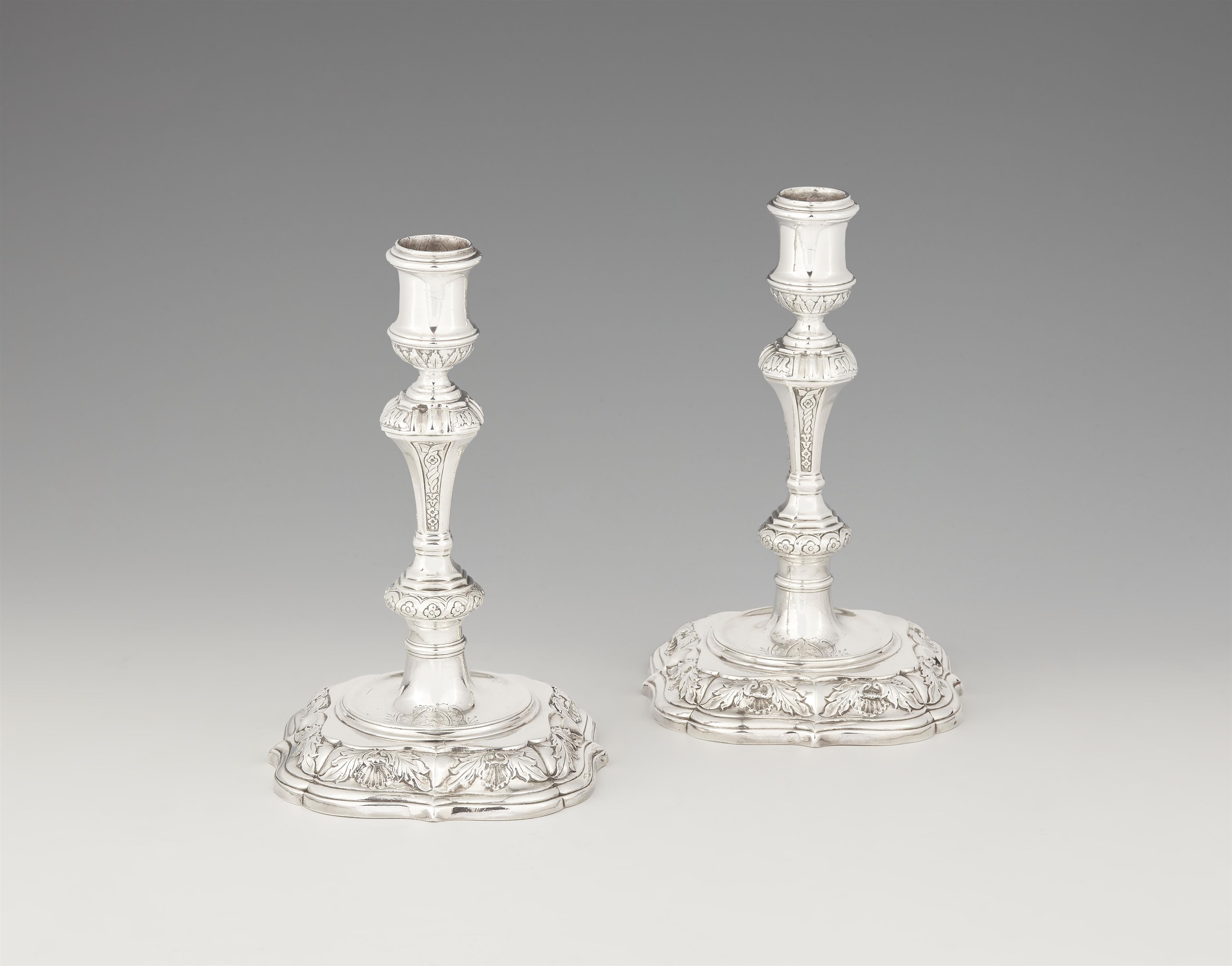 A pair of George I silver candlesticks - image-1