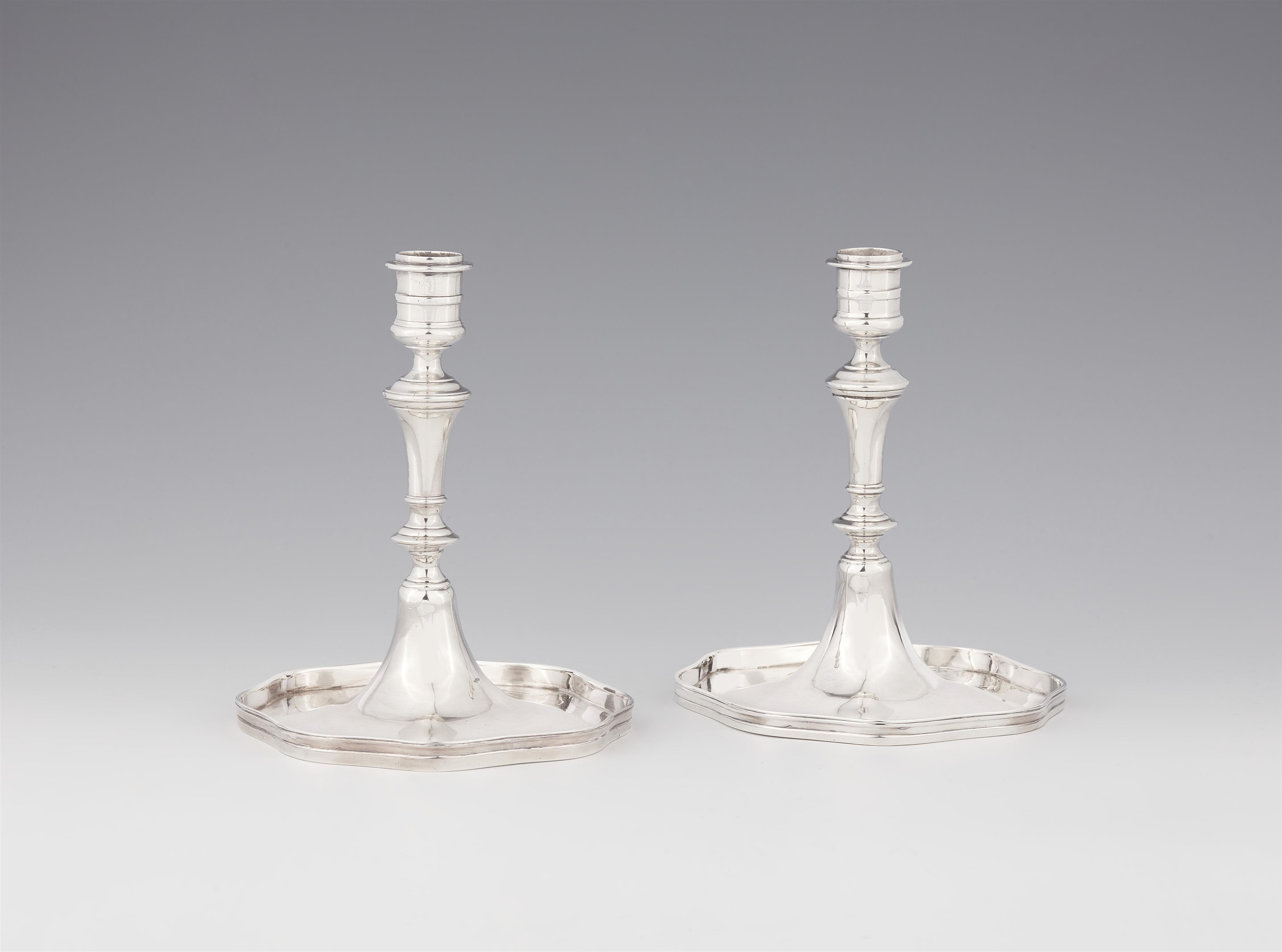 A pair of Vienna silver game table candlesticks - image-1