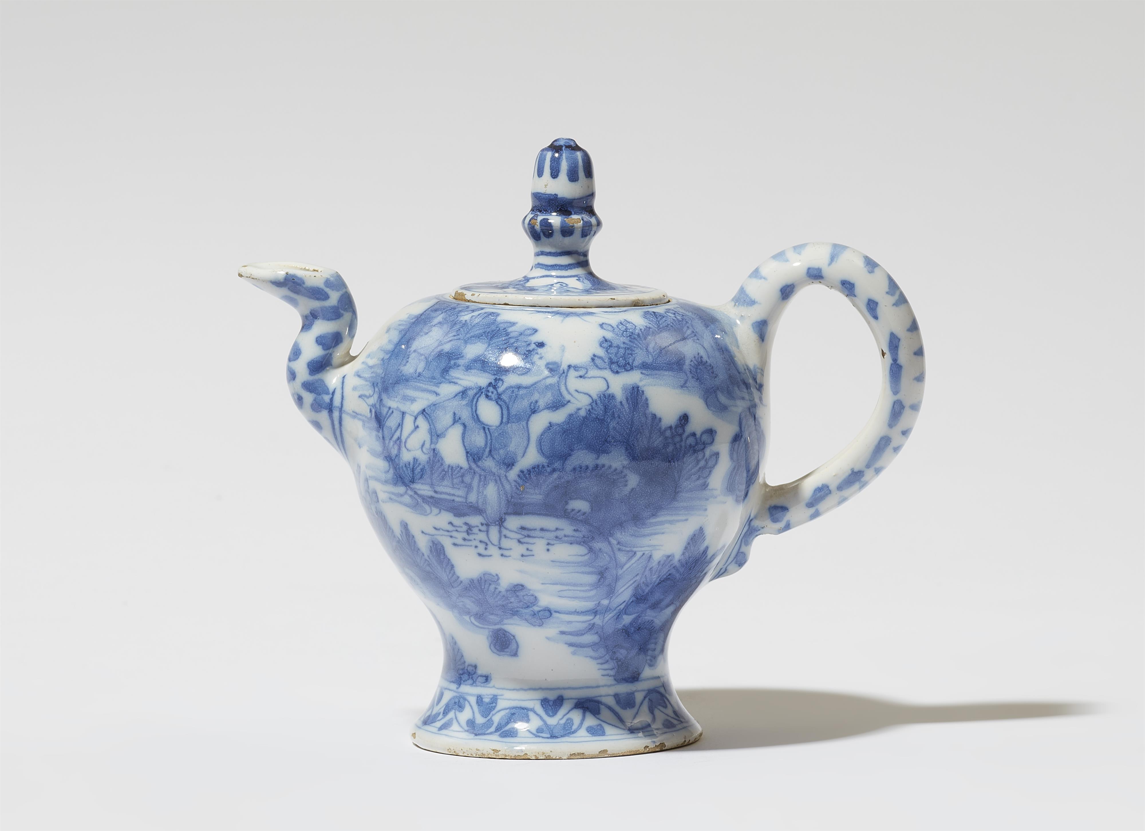 A Delft or Frankfurt faience teapot with Chinoiserie decor - image-1
