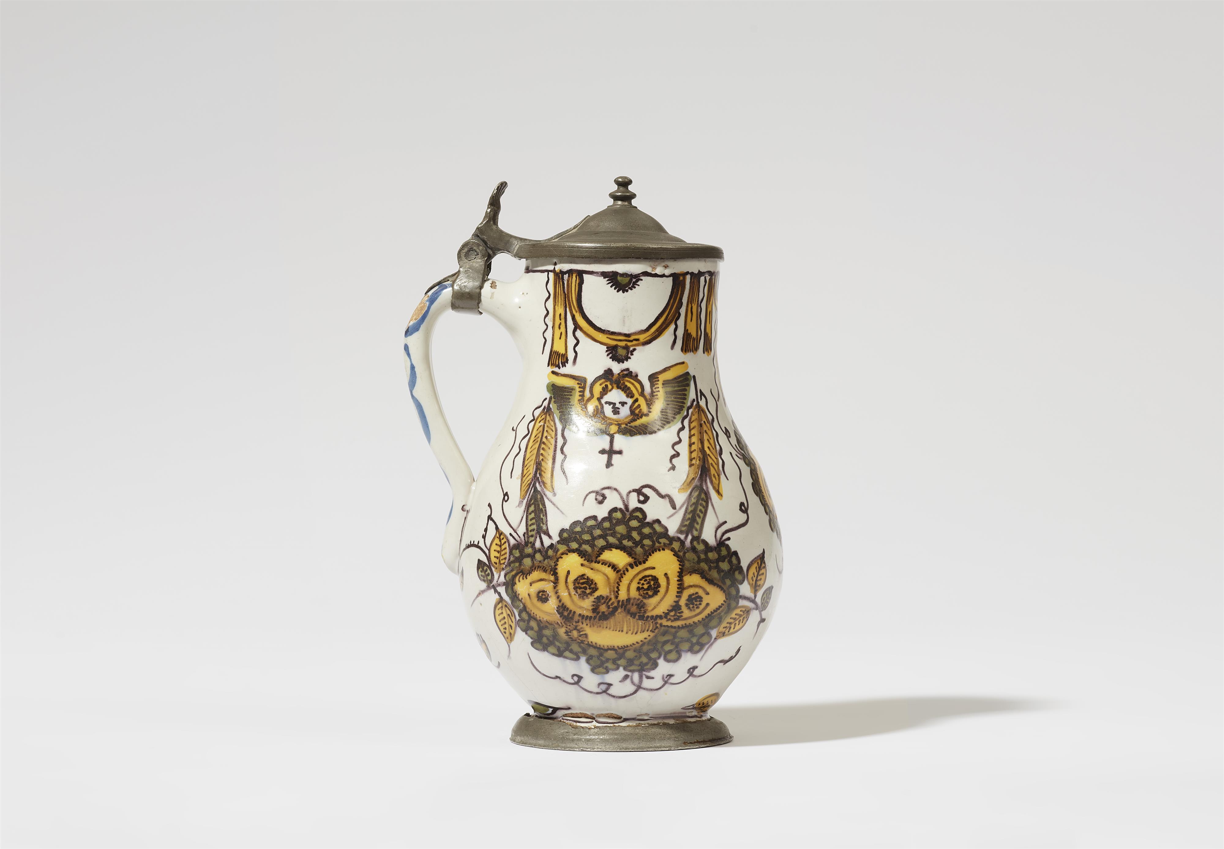 A faience jug with a fruit still life and angels - image-2