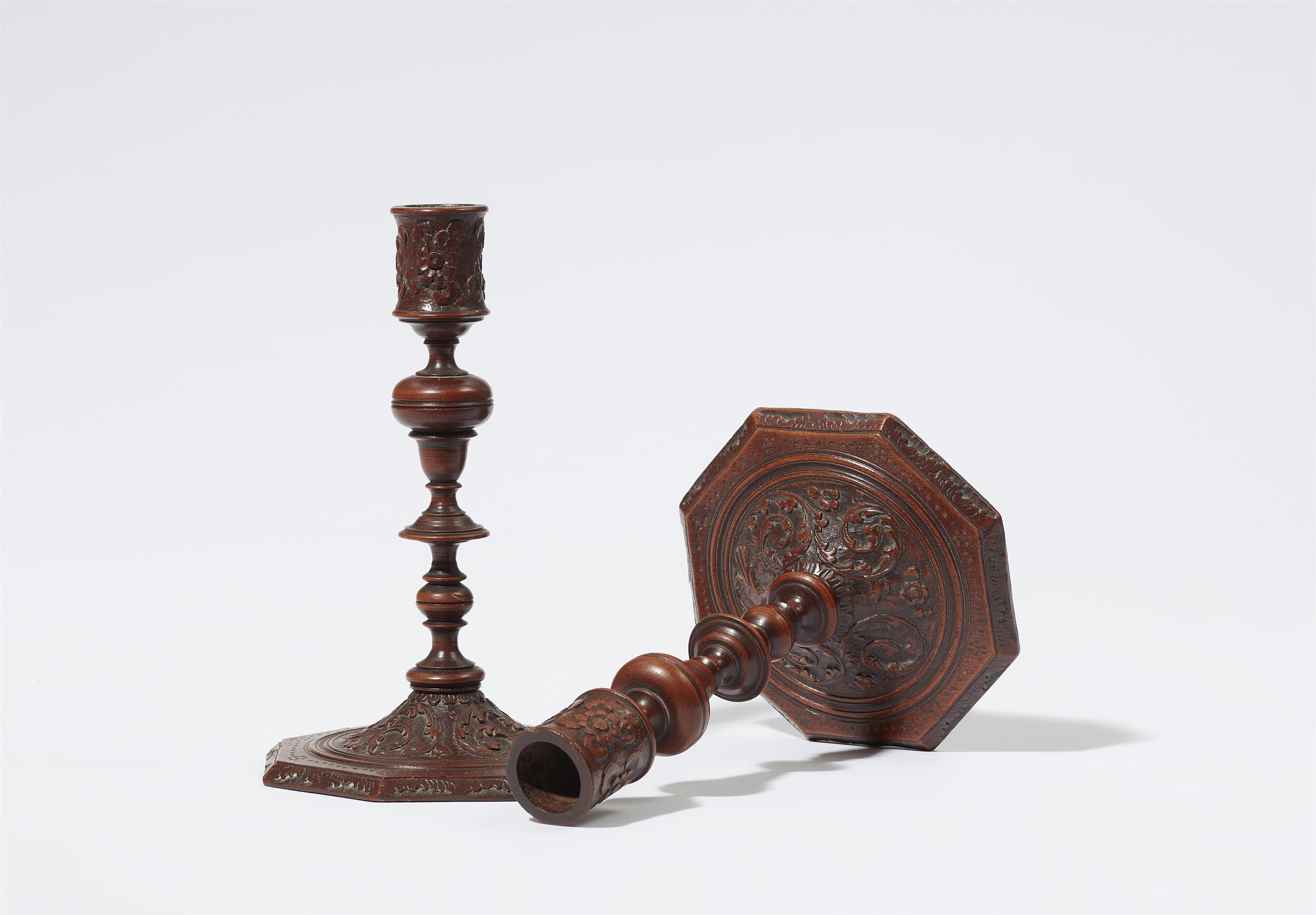 A museum quality pair of carved wood candlesticks - image-2