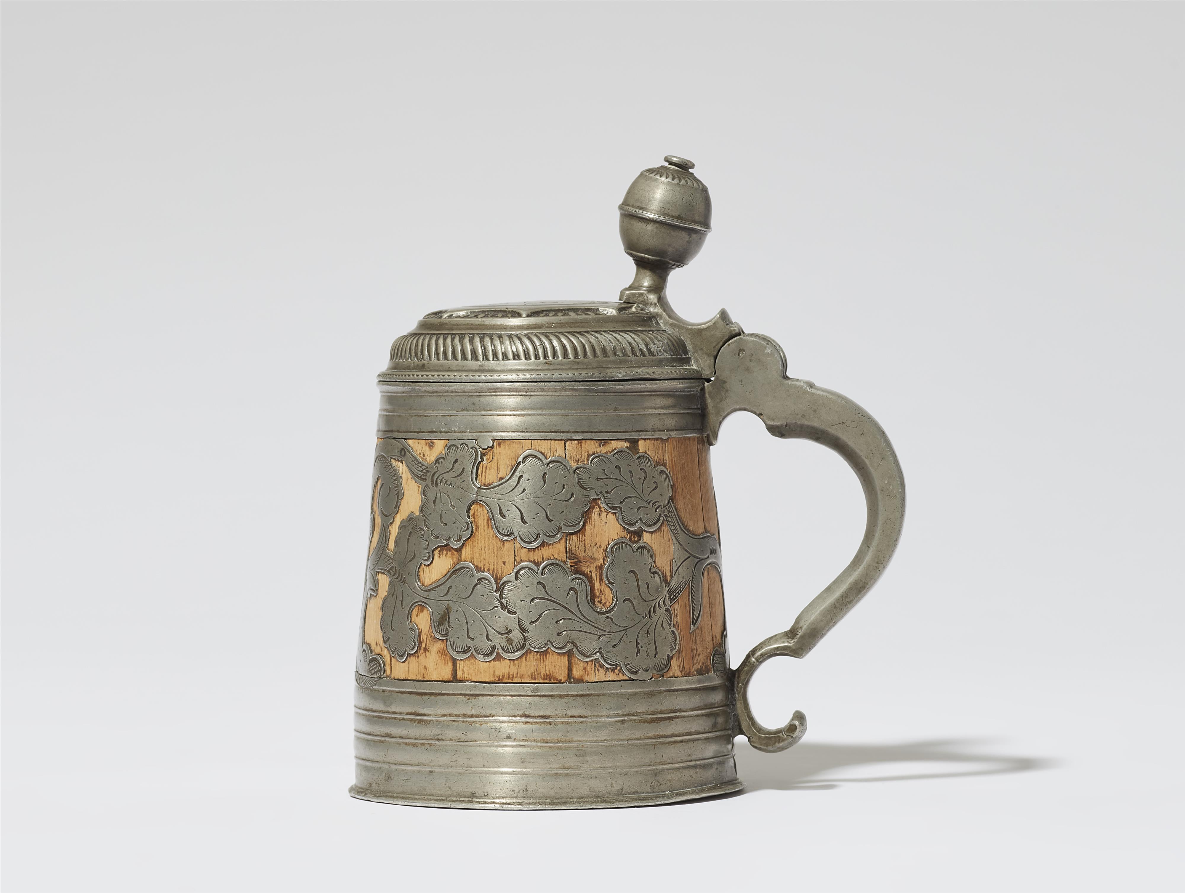A small Kulmach pewter-mounted tankard - image-1