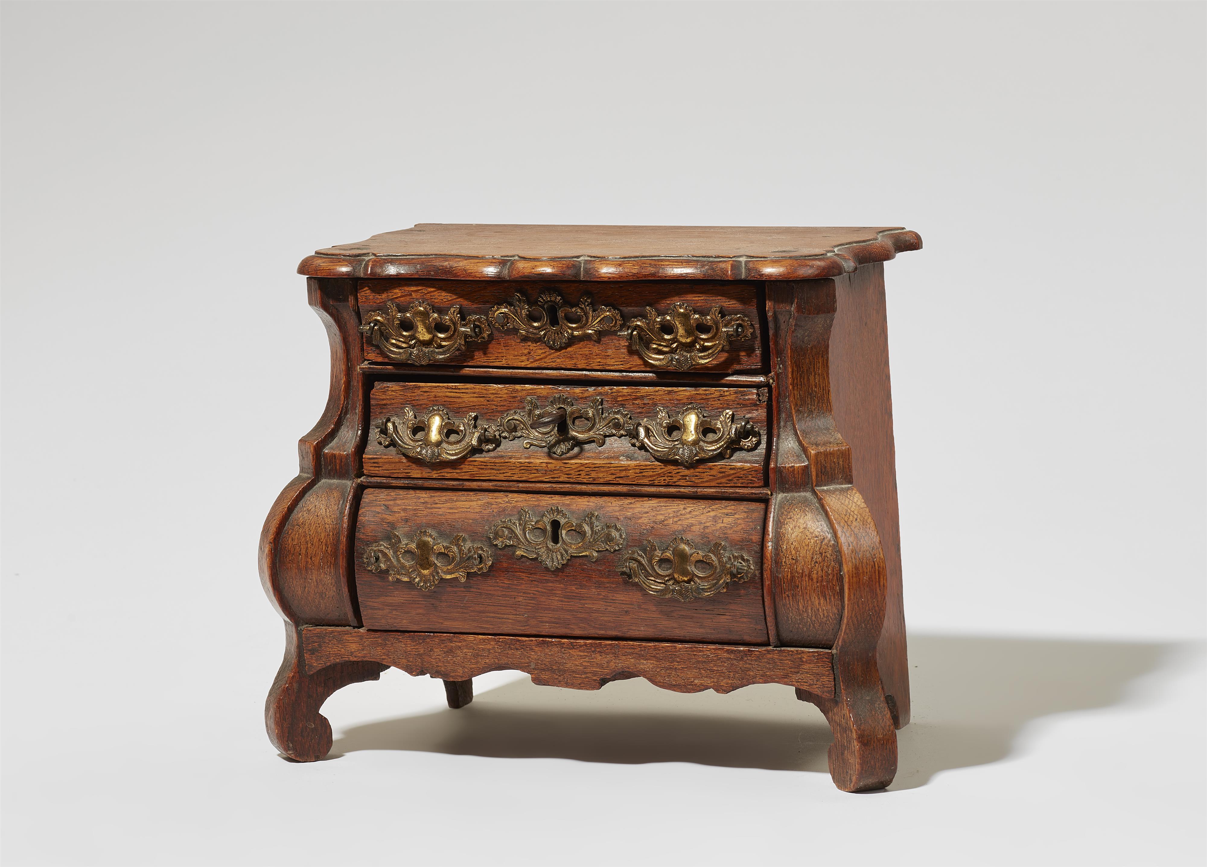 A small Dutch oak chest of drawers - image-1