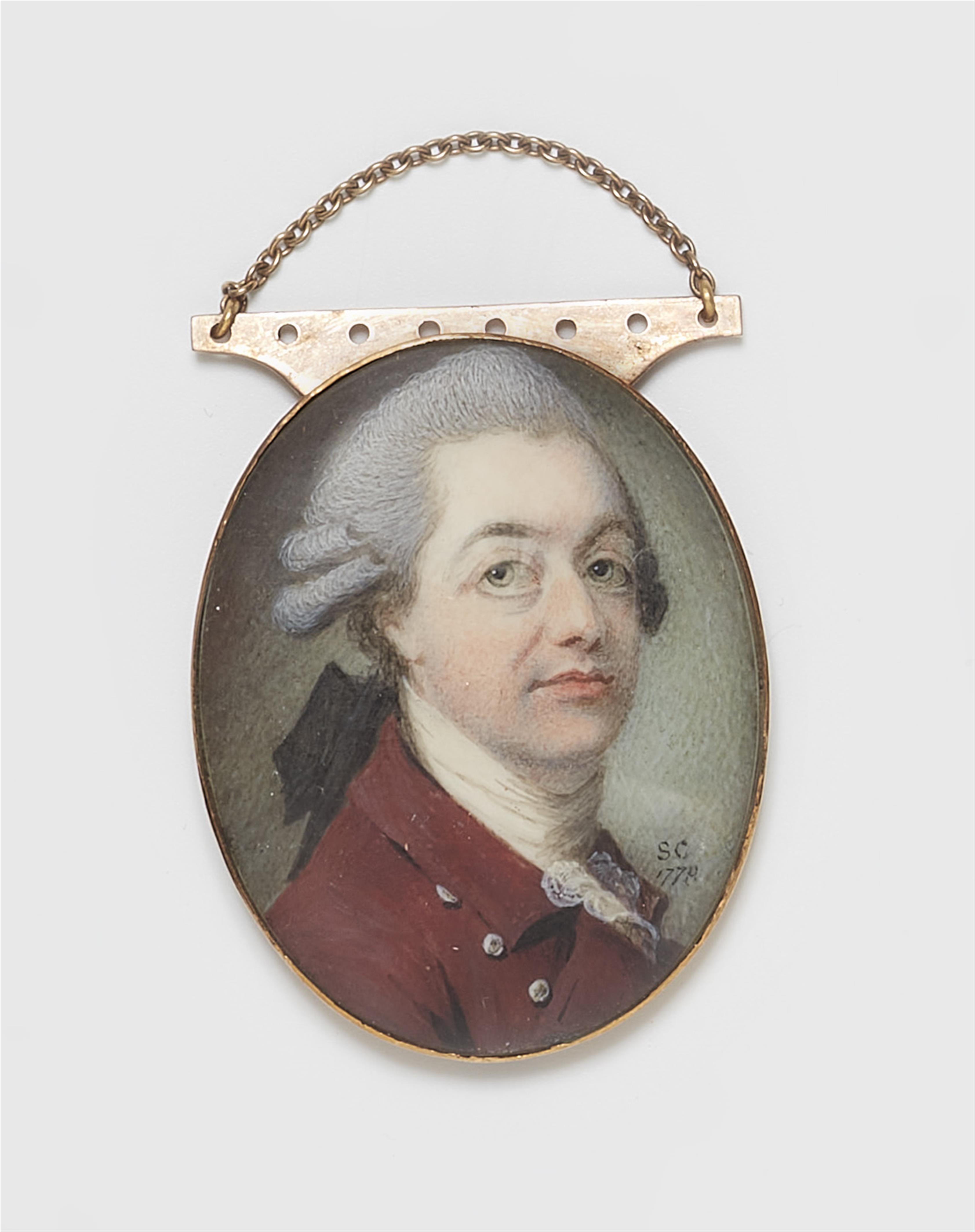 An English portrait miniature of a young gentleman in a claret red coat - image-1