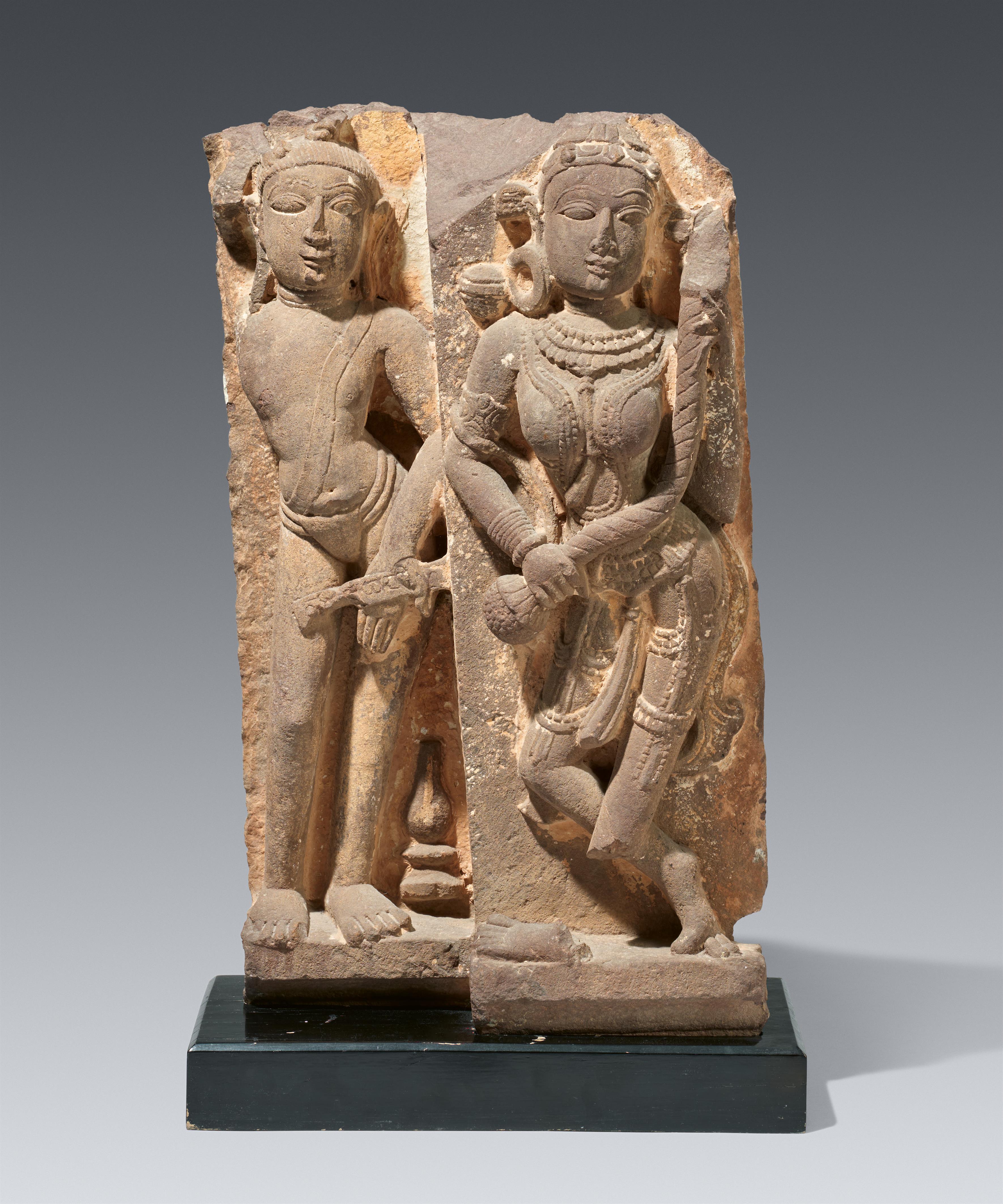 A Central Indian sandstone architectural fragment of a celestial nymph and her male companion. In the style of the 12/13th century - image-1