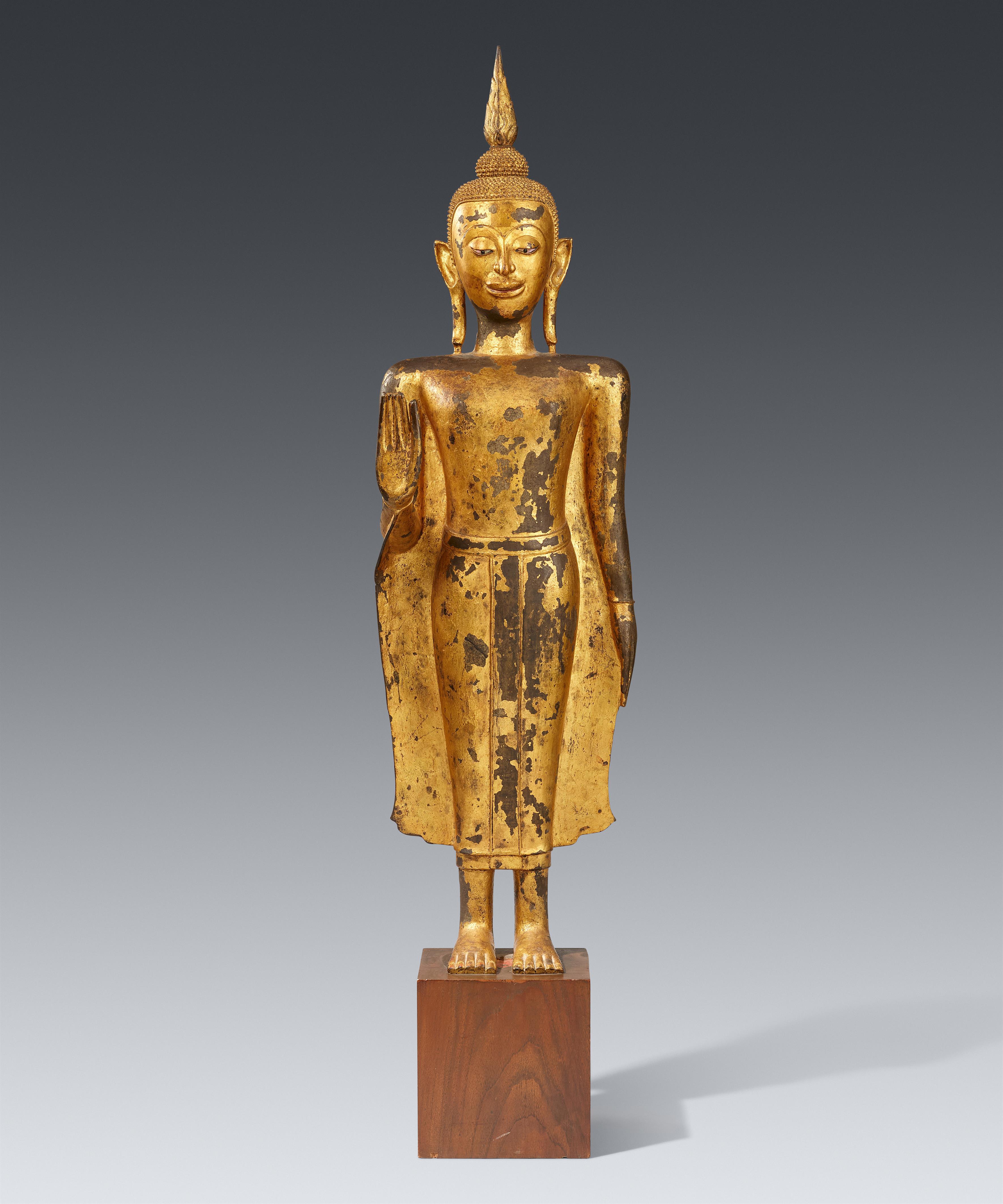 A gilt and lacquered bronze figure of Buddha Shakyamuni. Thailand/Laos. 17/18th century - image-1