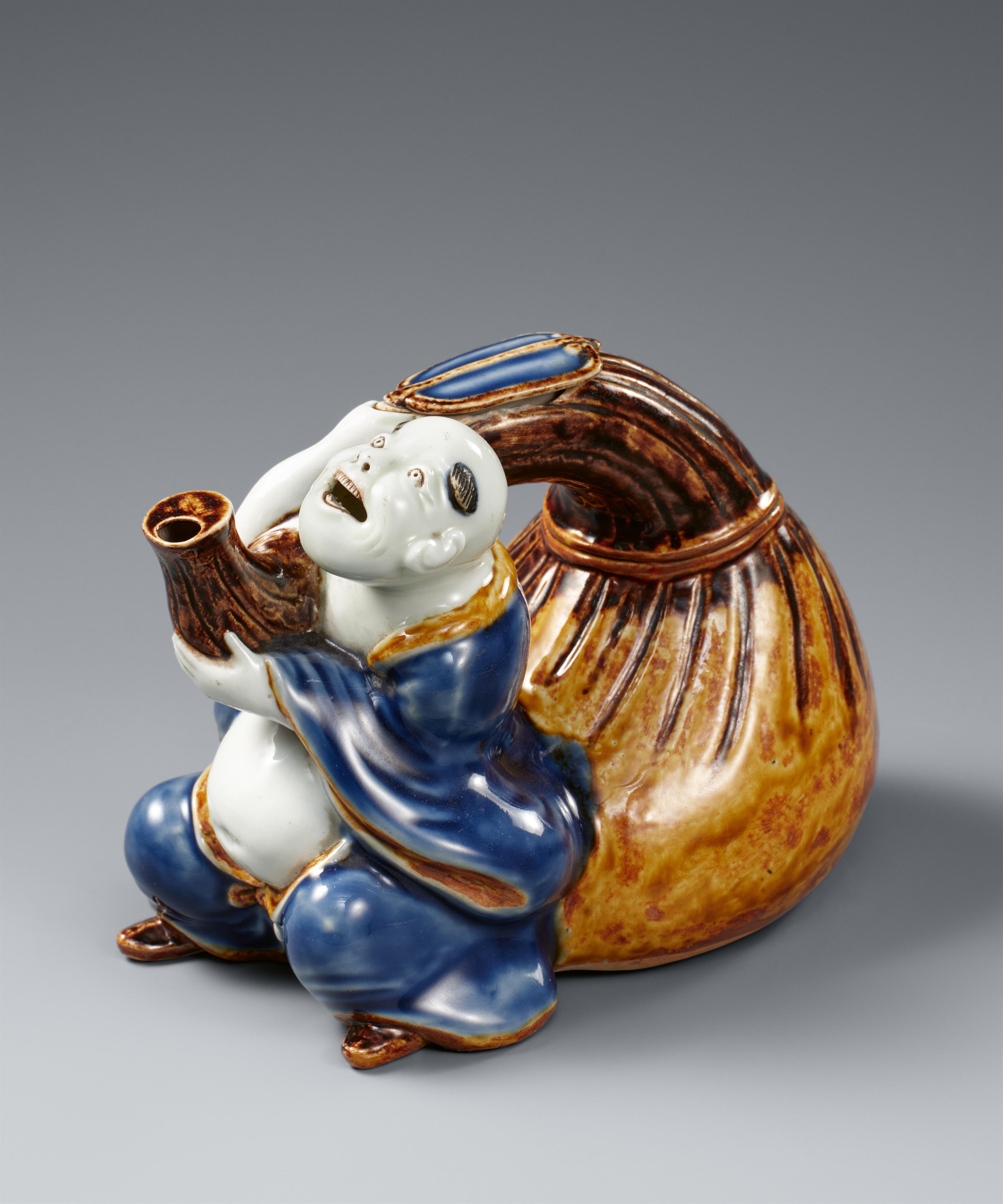 A Hirado sake ewer in shape of Hotei. Meiji period - image-1