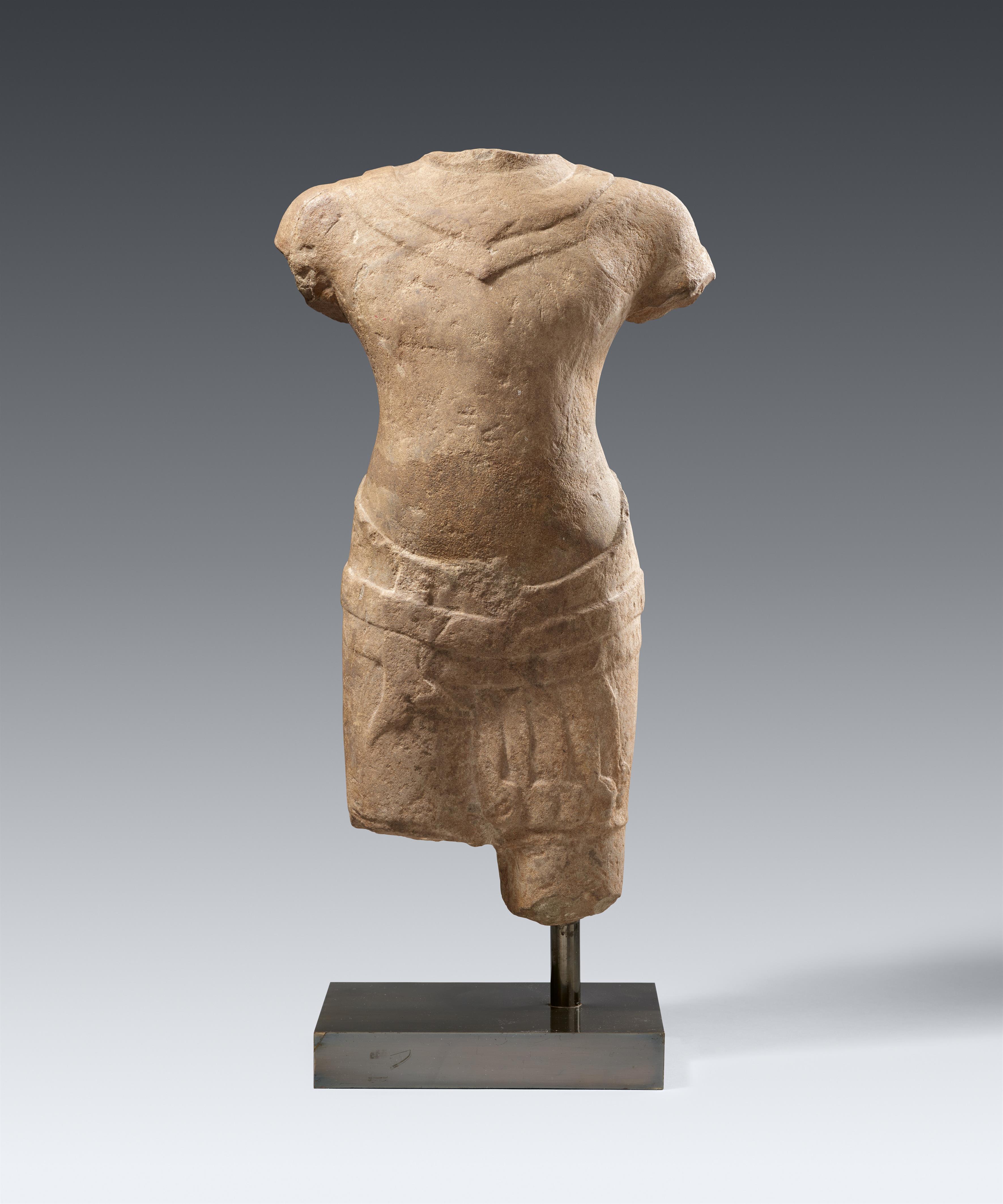 A Baphuon sandstone male torso. Cambodia. 11/ early 12th century - image-1