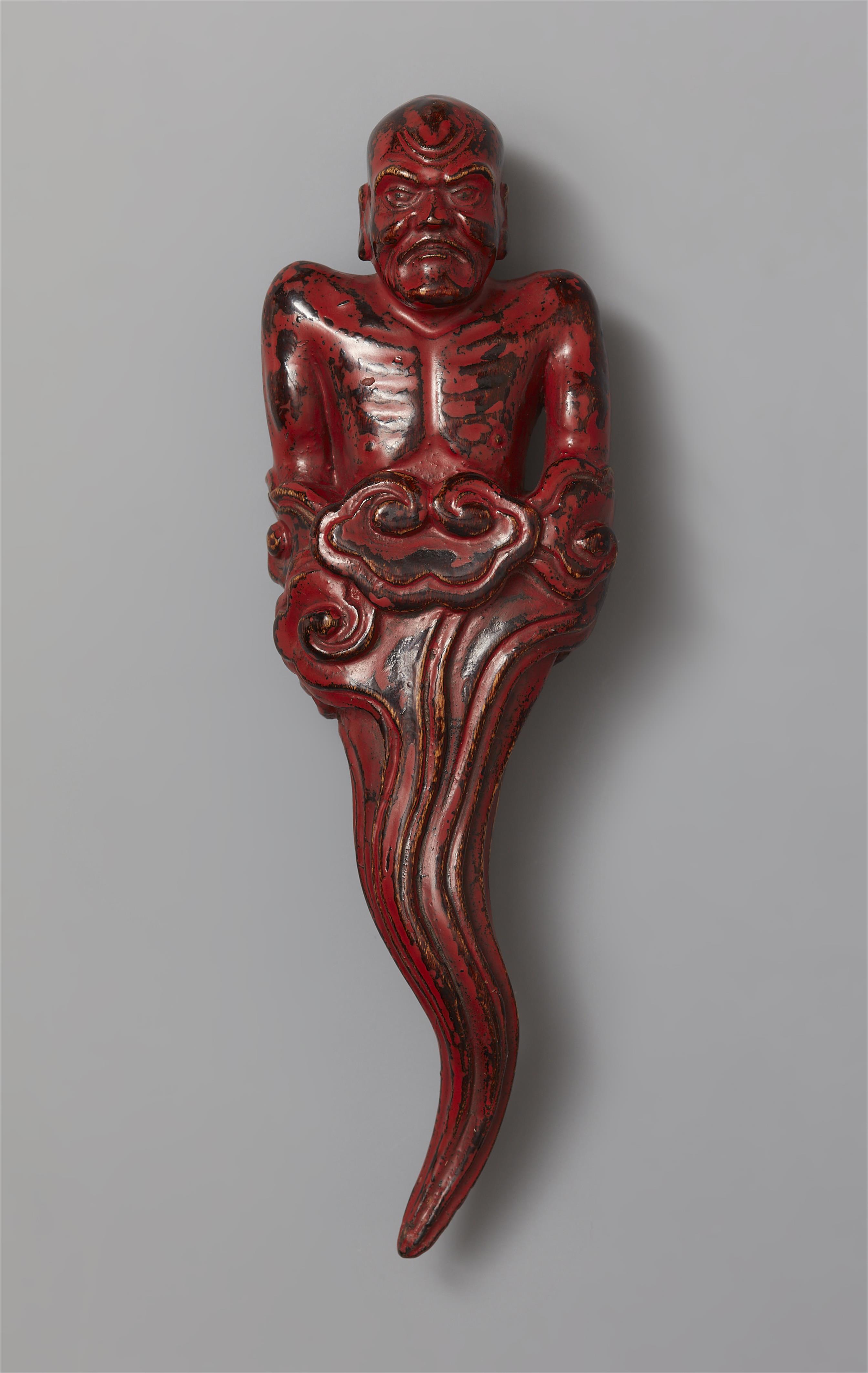 A black and red-lacquered softwood netsuke of a man rising from a cloud. 19th century - image-3