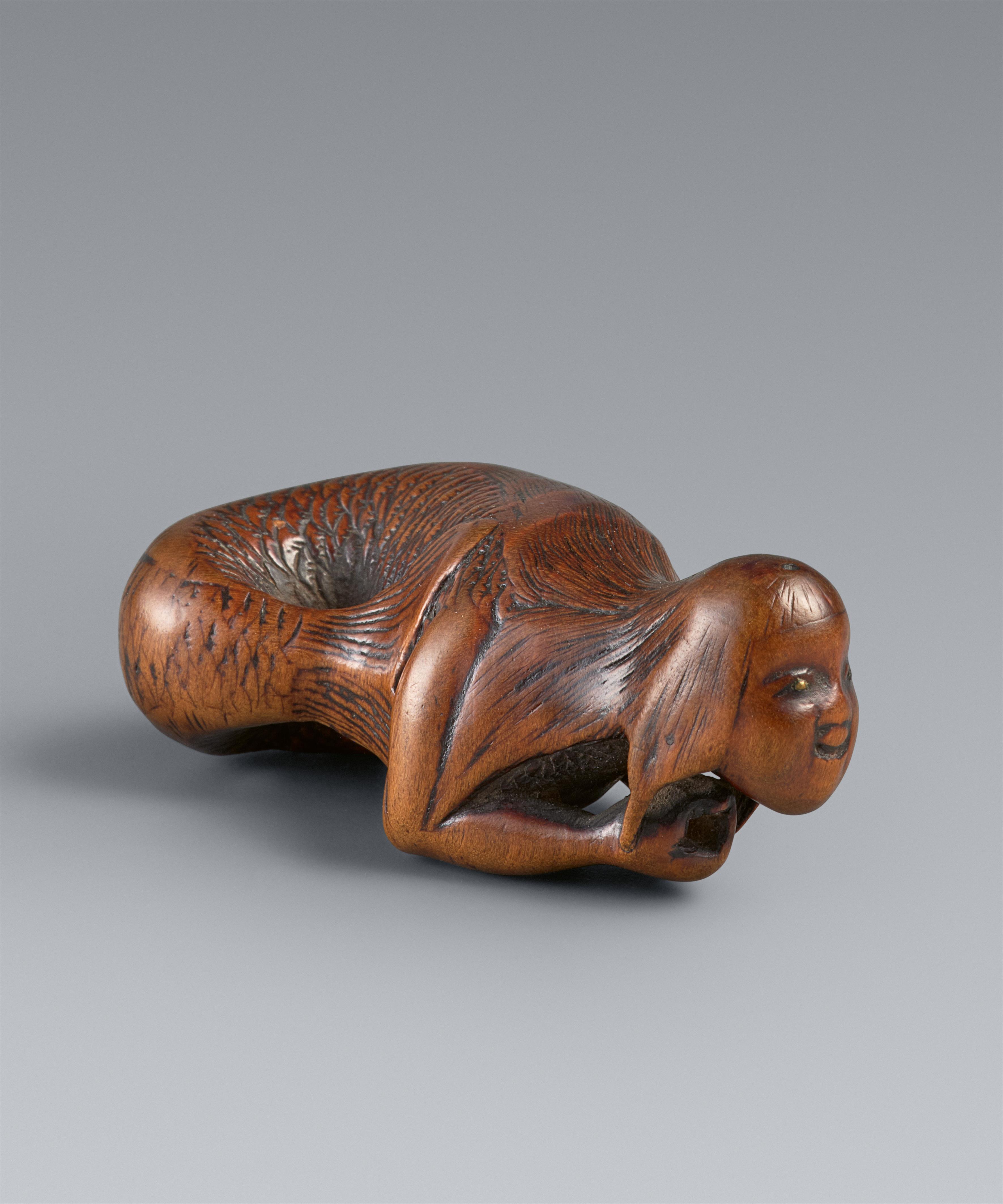 Netsuke eines Meerweibchens (ningyo). Buchsbaum. Frühes 19. Jh. - image-1