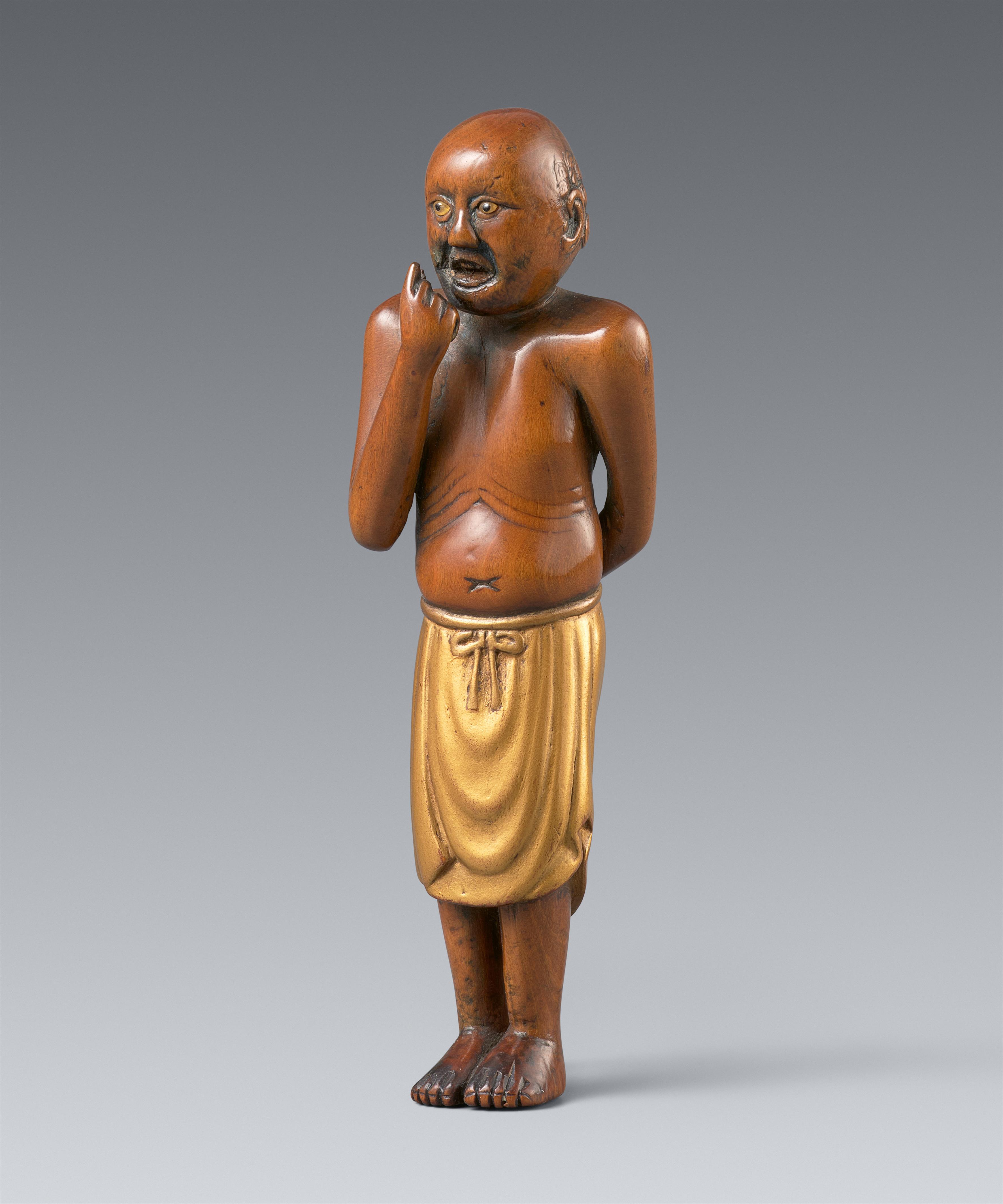 A boxwood and lacquer netsuke of an islander. 19th century - image-1