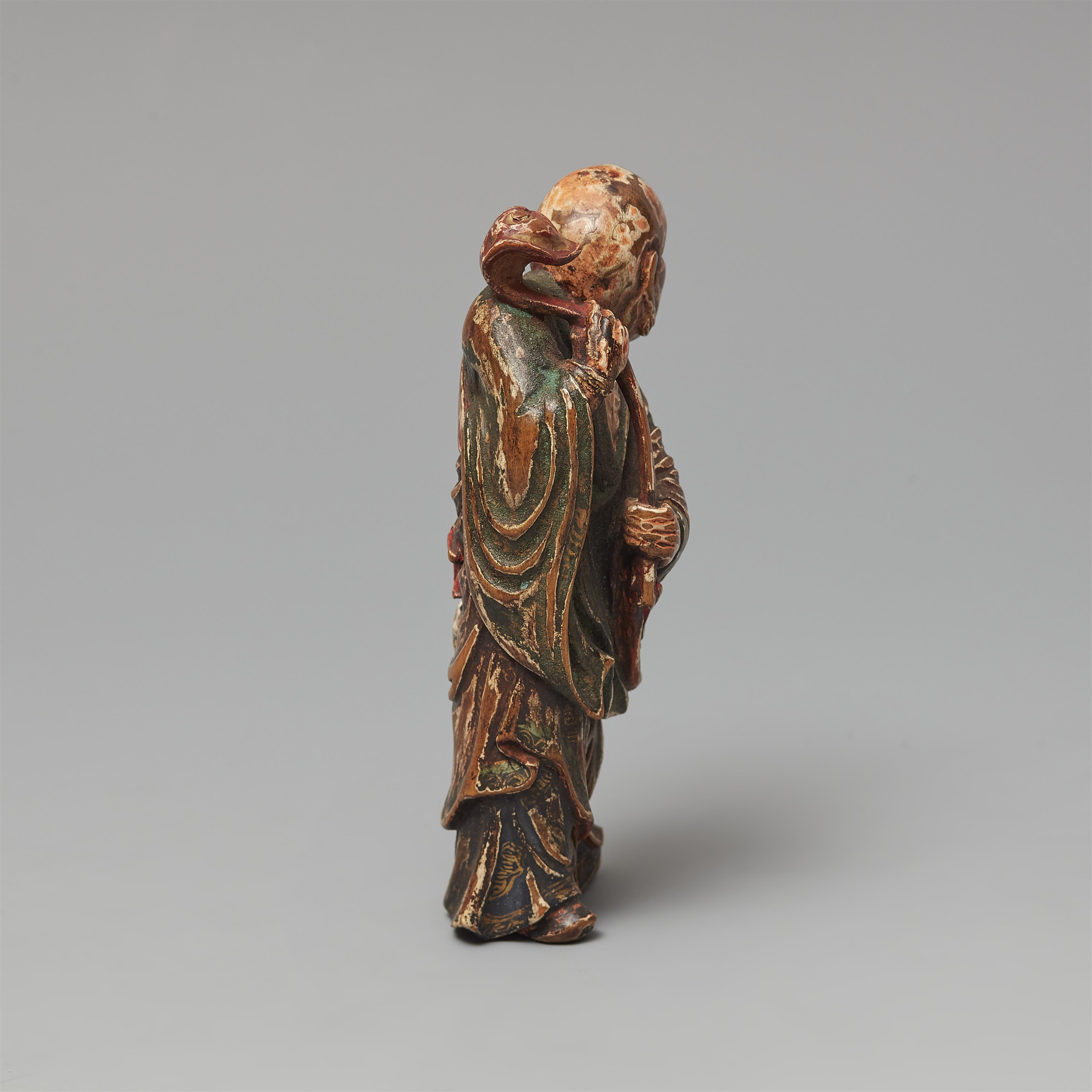 A polychromed softwood netsuke of a rakan, in the style of Shuzan. 19th century - image-4