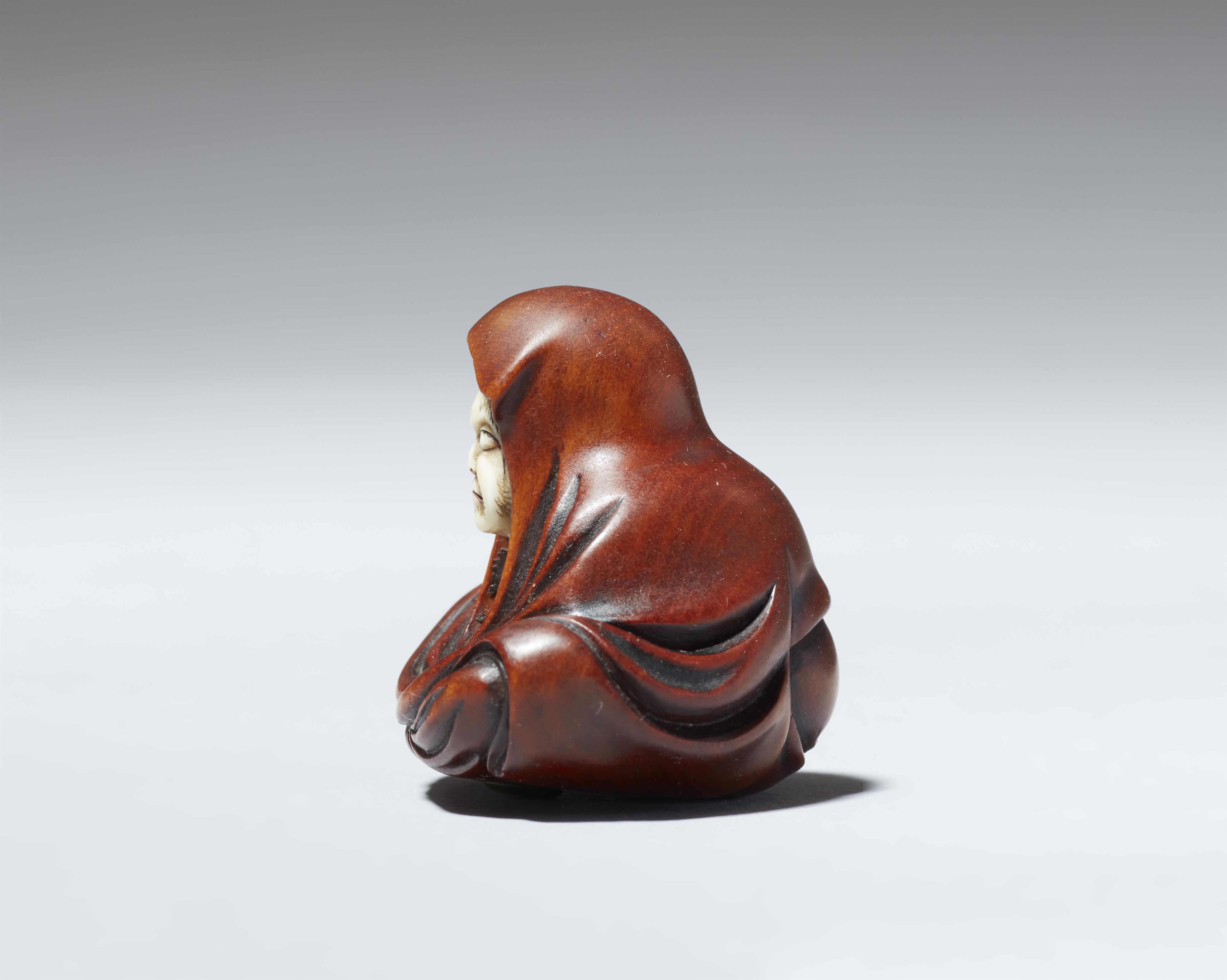 An Edo boxwood and ivory netsuke of Daruma by Shugetsu. Mid-19th century - image-3