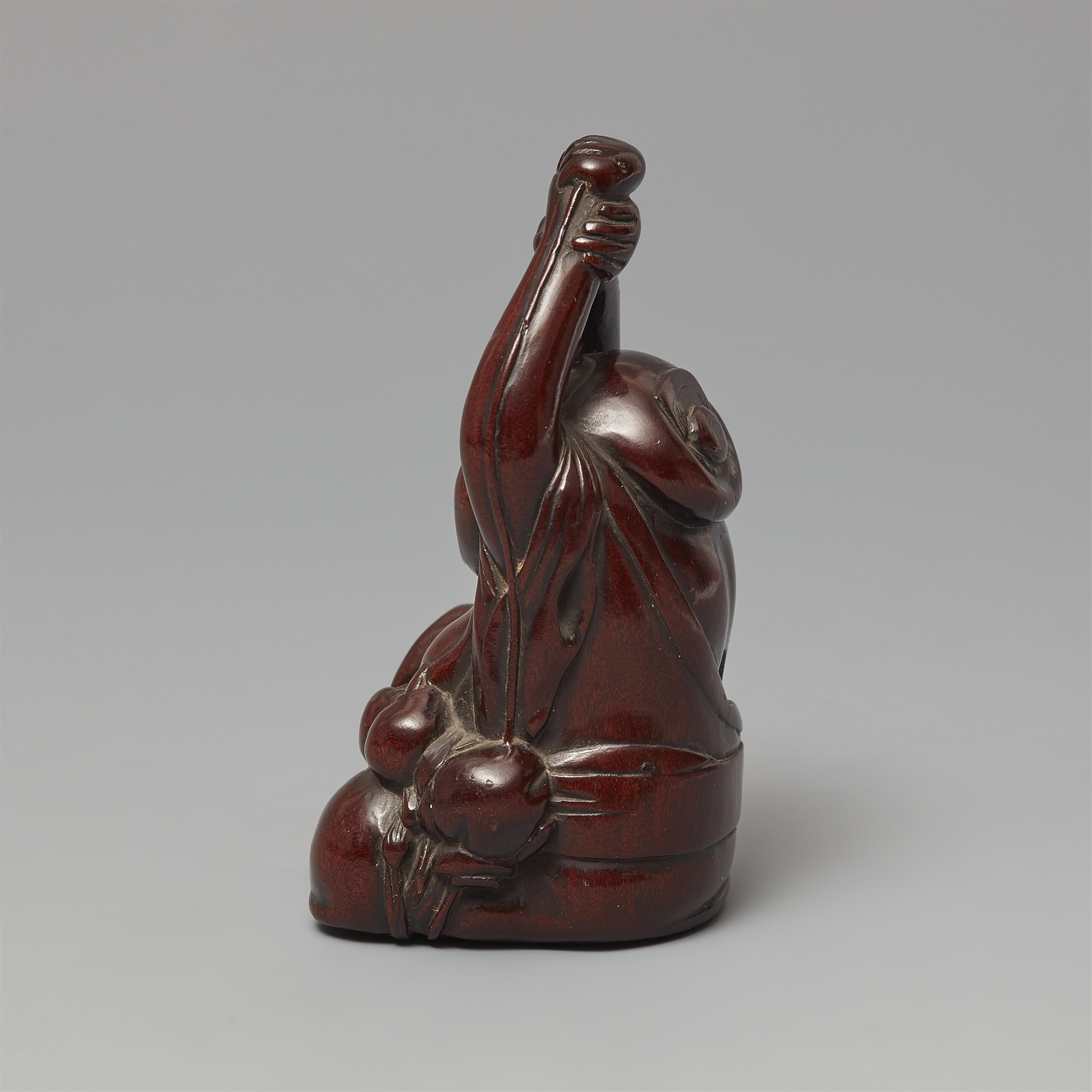 A large and unusual wood netsuke of a yawning Okame with a baby. 19th century - image-2