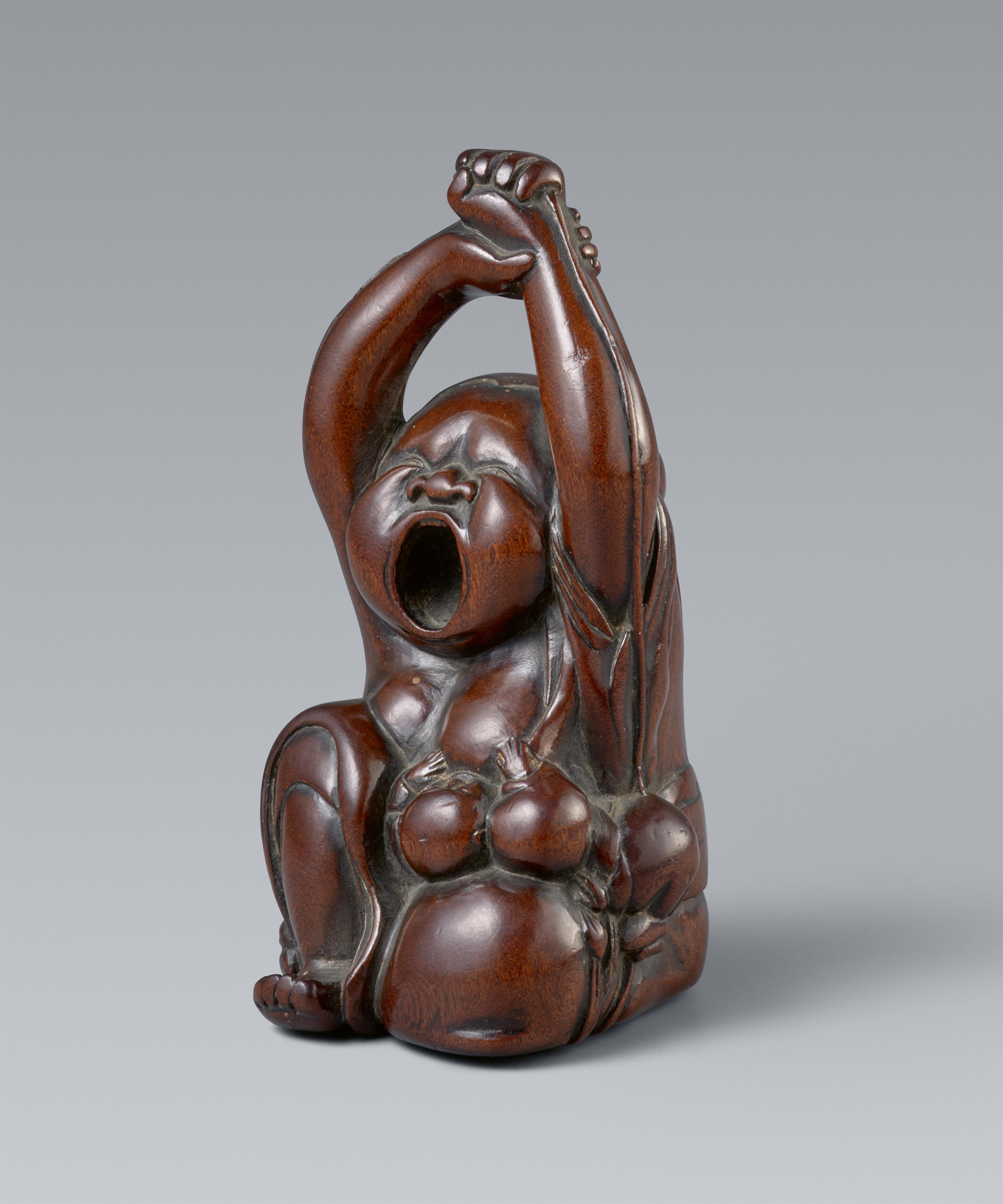 A large and unusual wood netsuke of a yawning Okame with a baby. 19th century - image-1