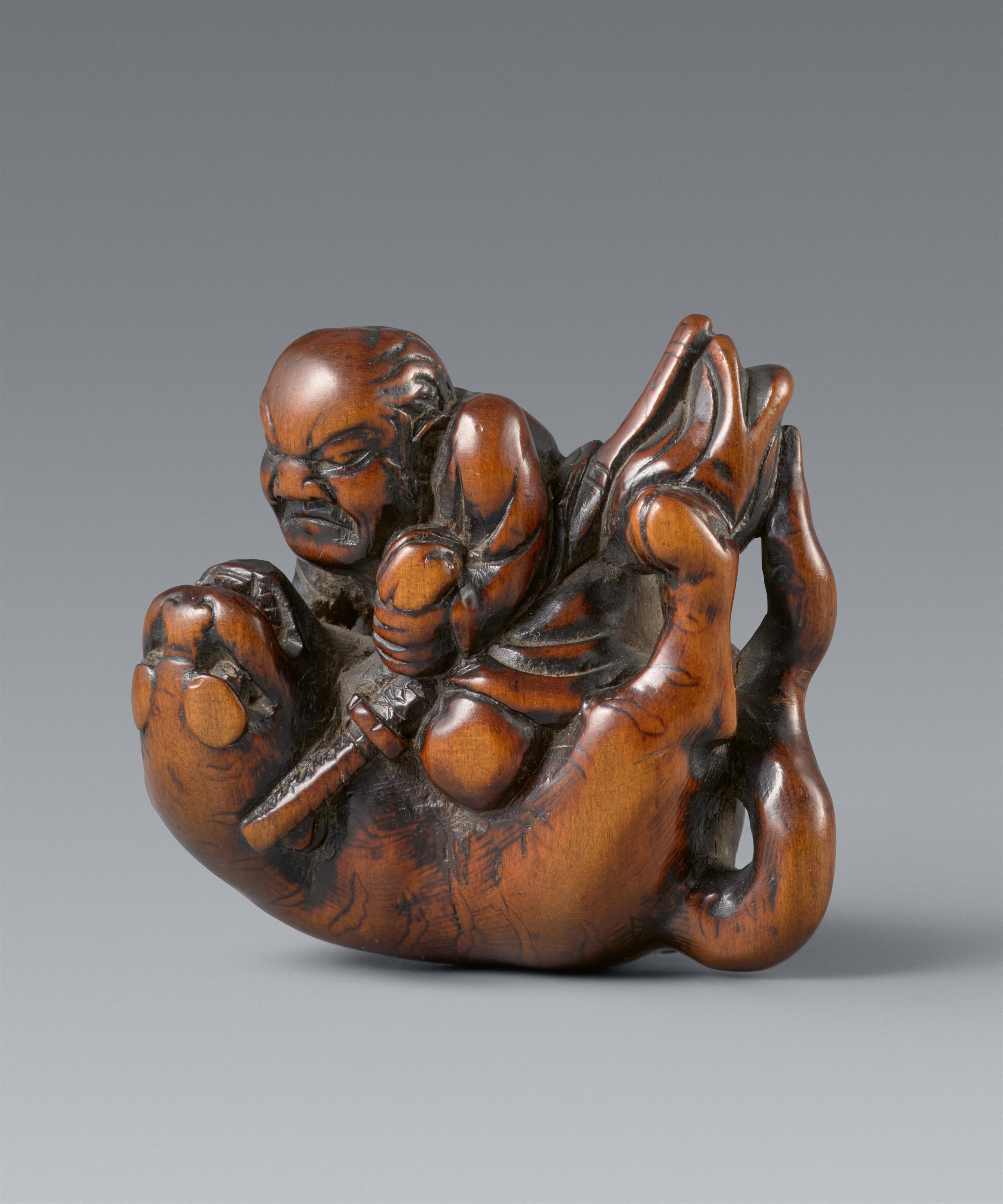 A powerful boxwood netsuke of Busho and a tiger. 18/early 19th century - image-1