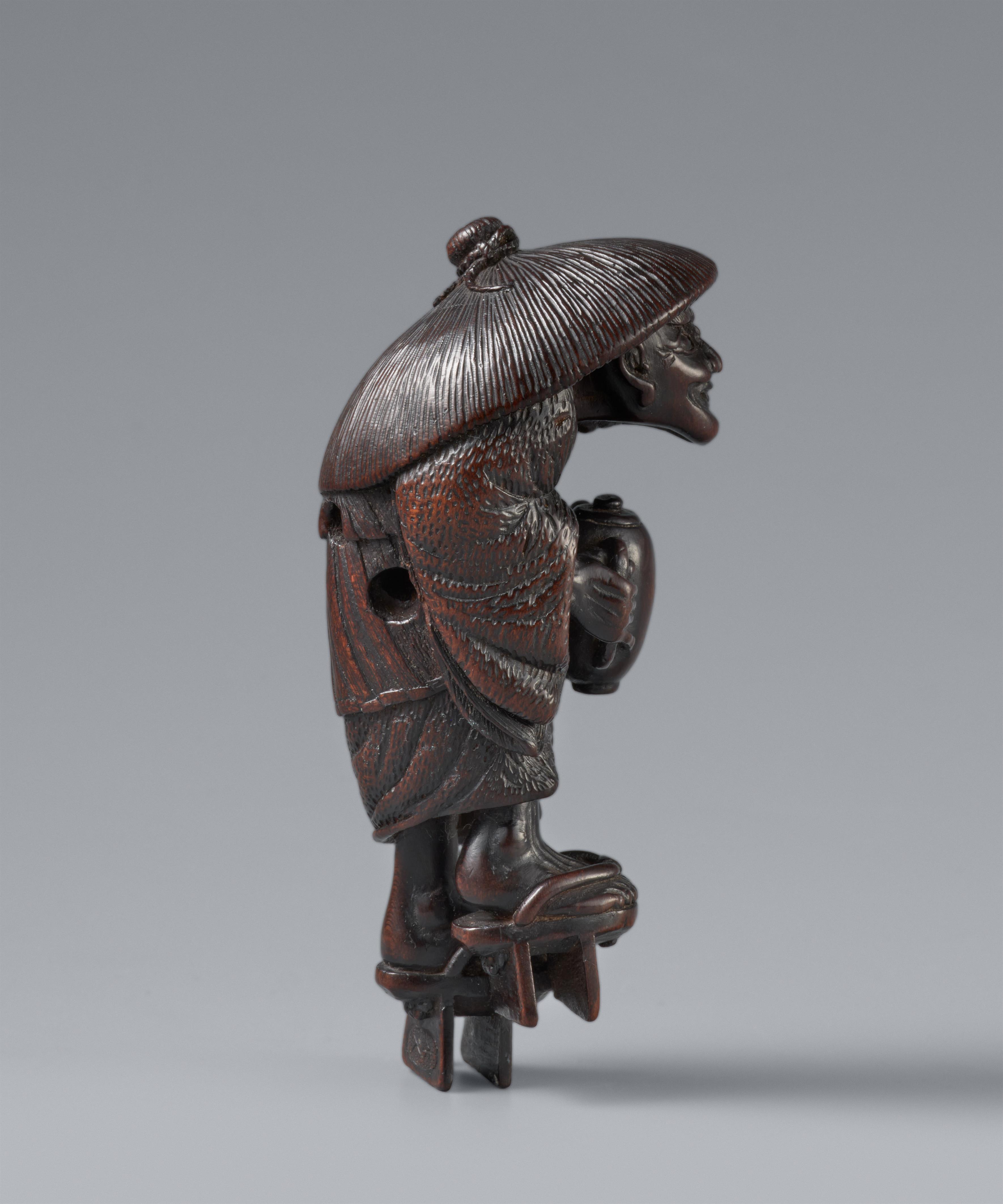 Netsuke des sogenannte Öldiebs (abura -bozu). Dunkles Holz. 19. Jh. - image-8