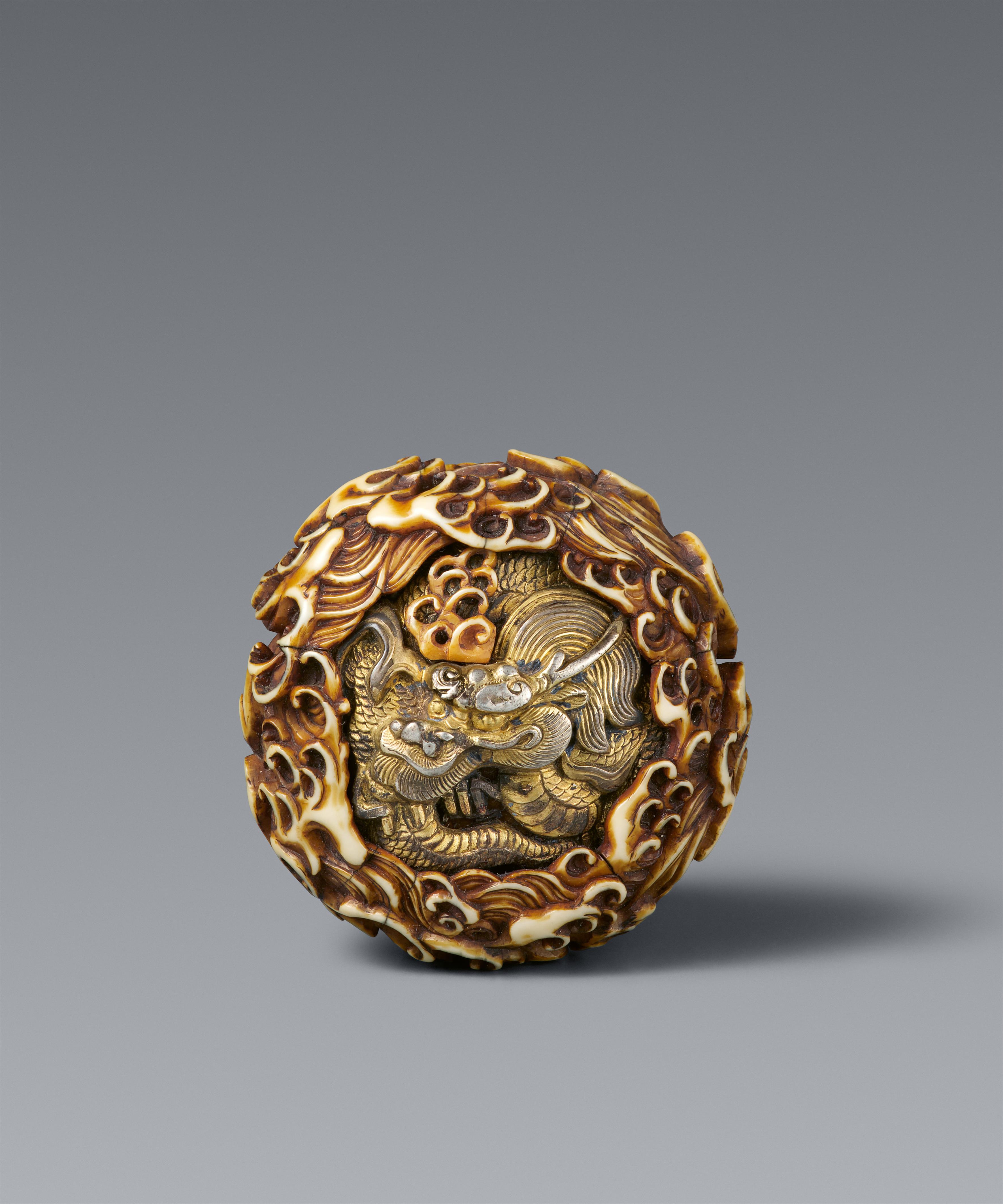 An ivory manju netsuke of a dragon amidst waves by Hironobu. Second half 19th century - image-1