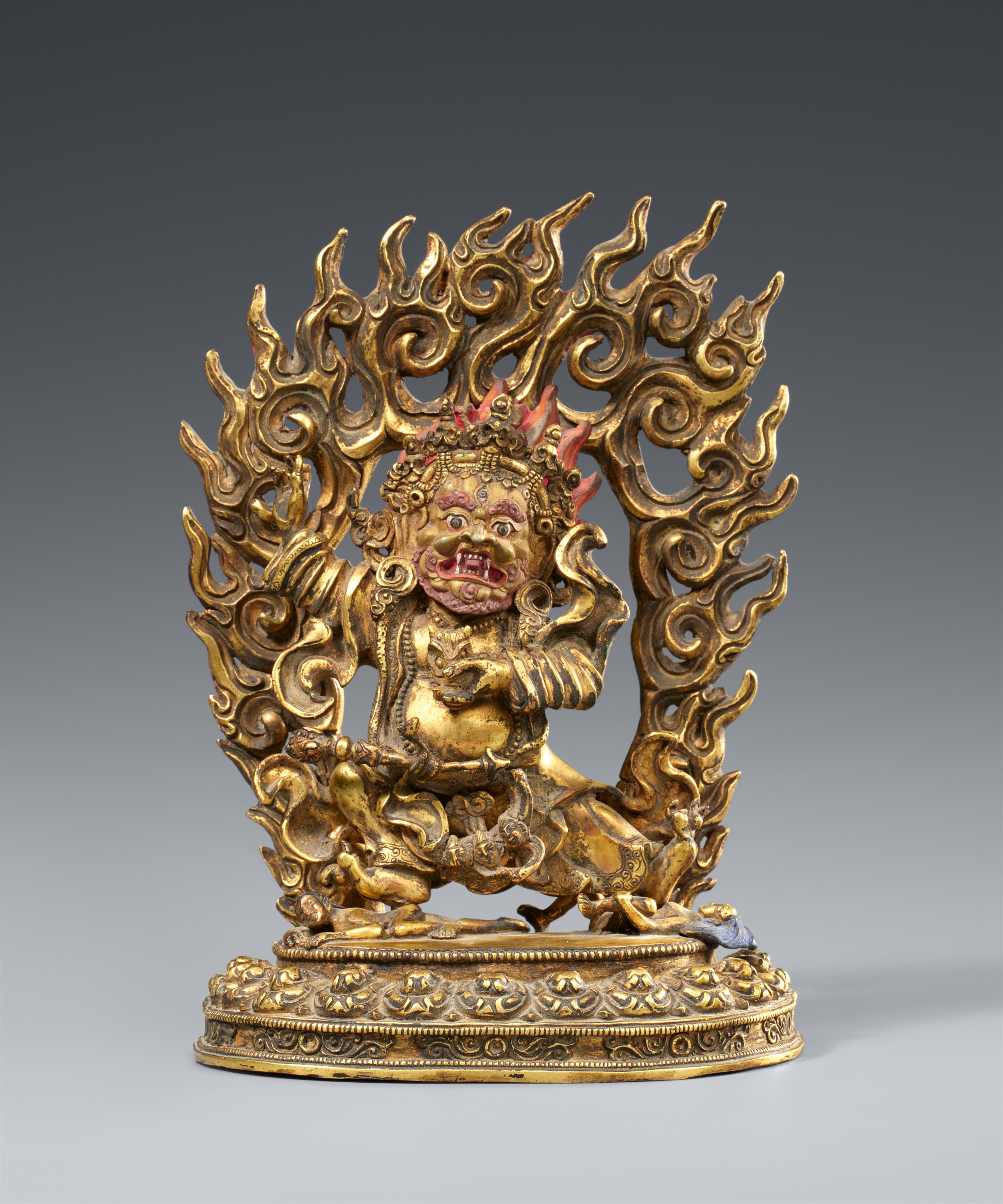 A Sino-Tibetan fire-gilt and partially painted bronze figure of Mahakala. 19/20th century - image-1