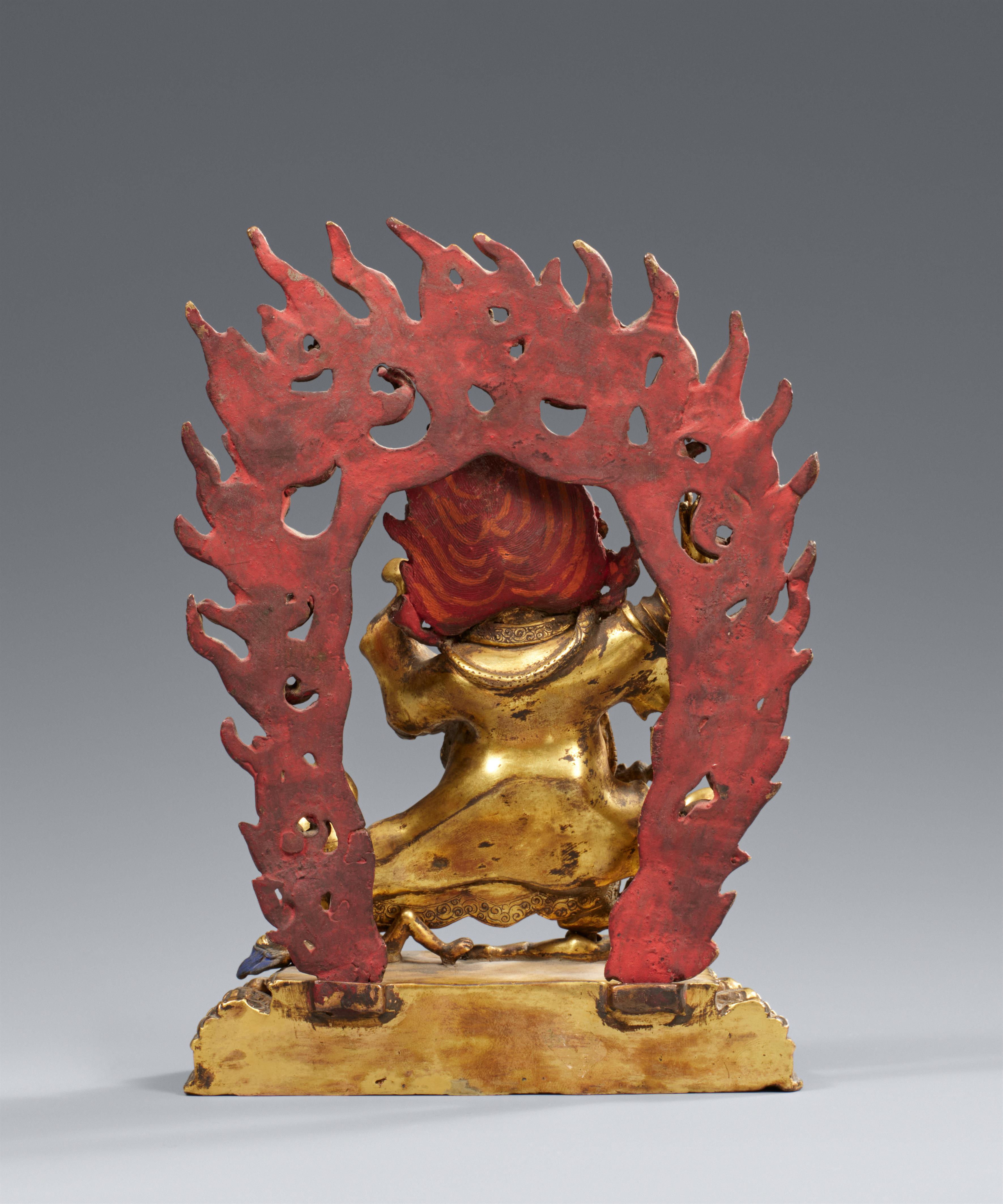 A Sino-Tibetan fire-gilt and partially painted bronze figure of Mahakala. 19/20th century - image-2