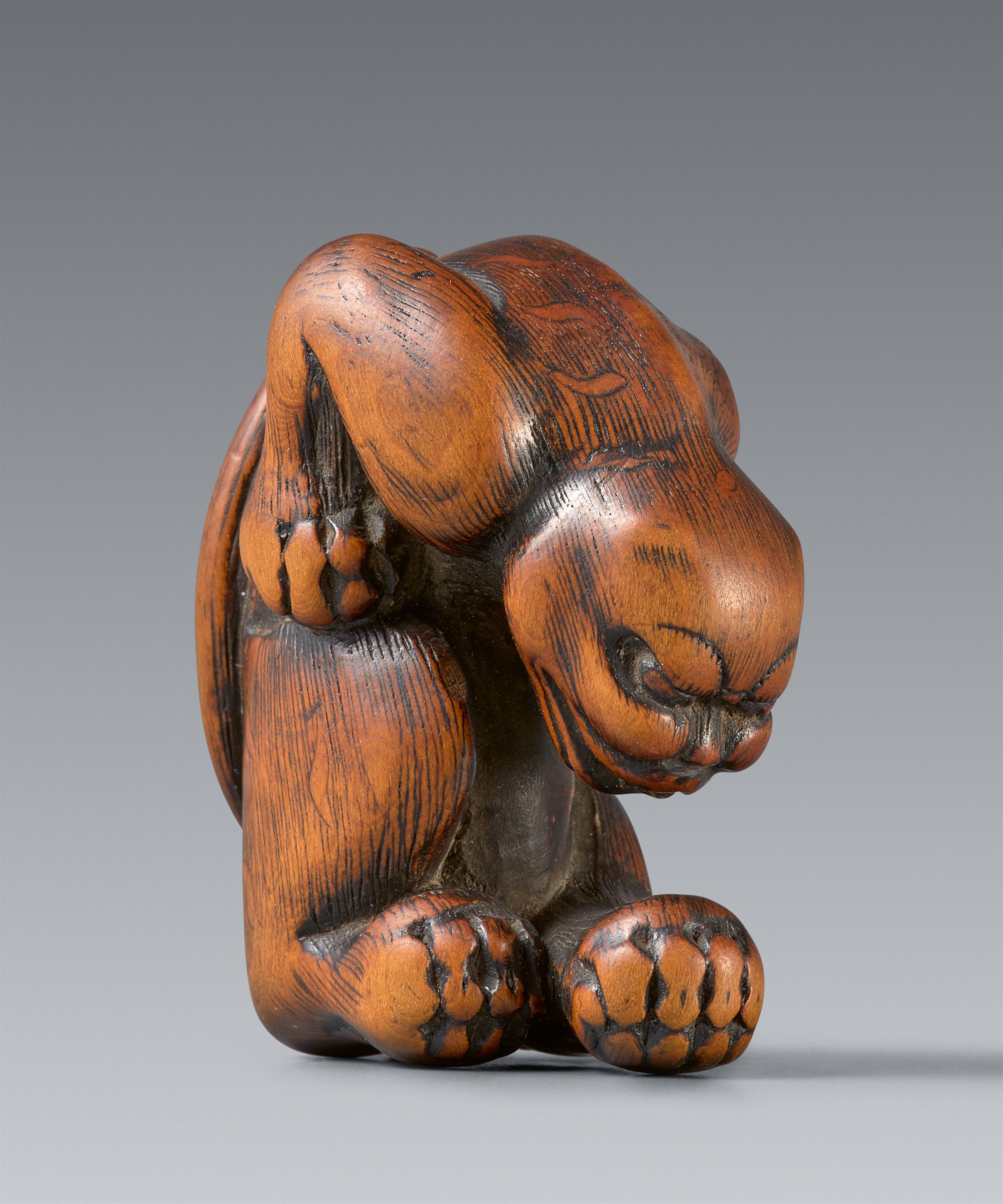 A unusual Kyoto boxwood netsuke of a tiger. Late 18th century - image-1