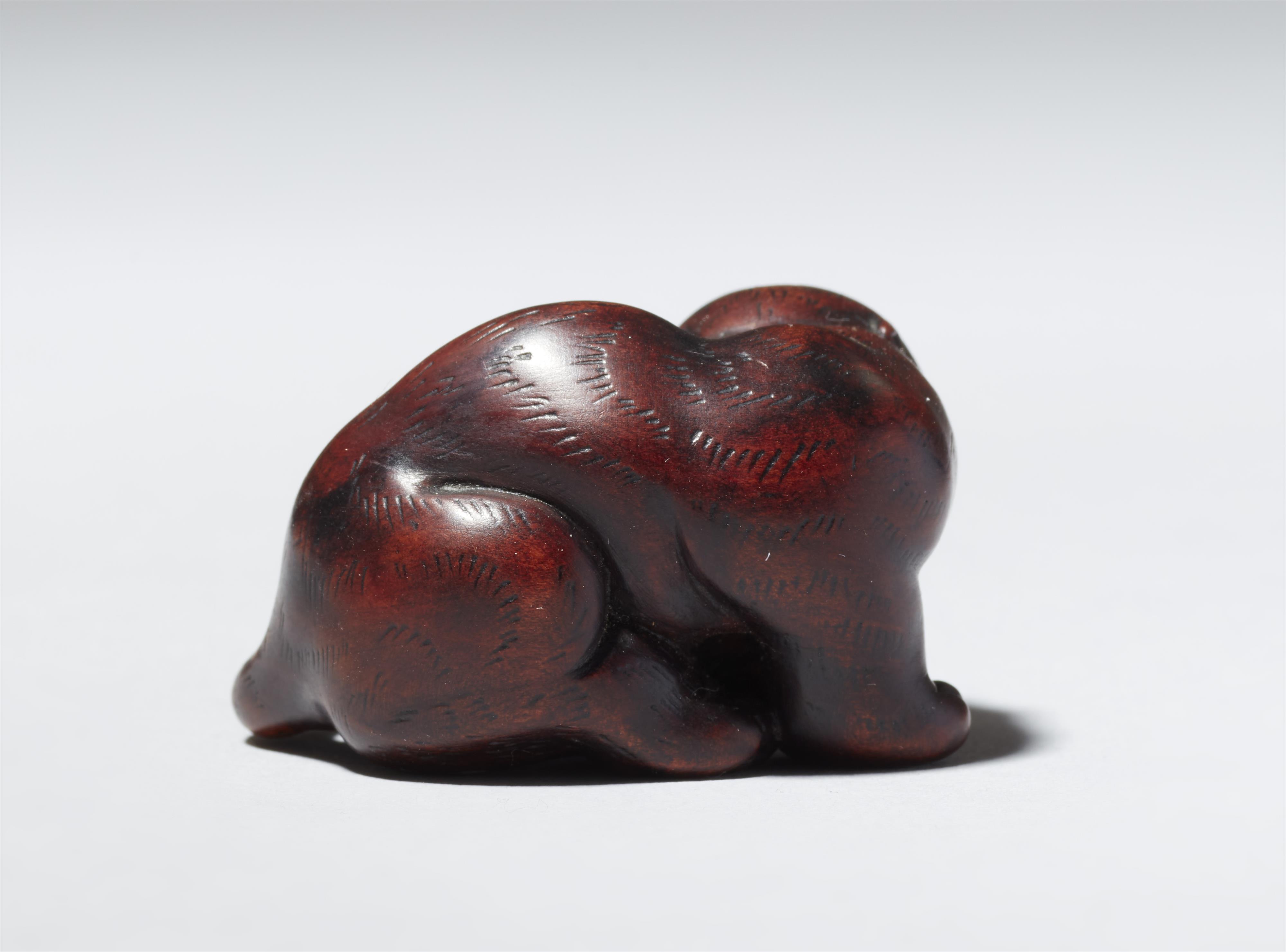 Netsuke eines fauchenden Tigers. Holz. 19. Jh. - image-5