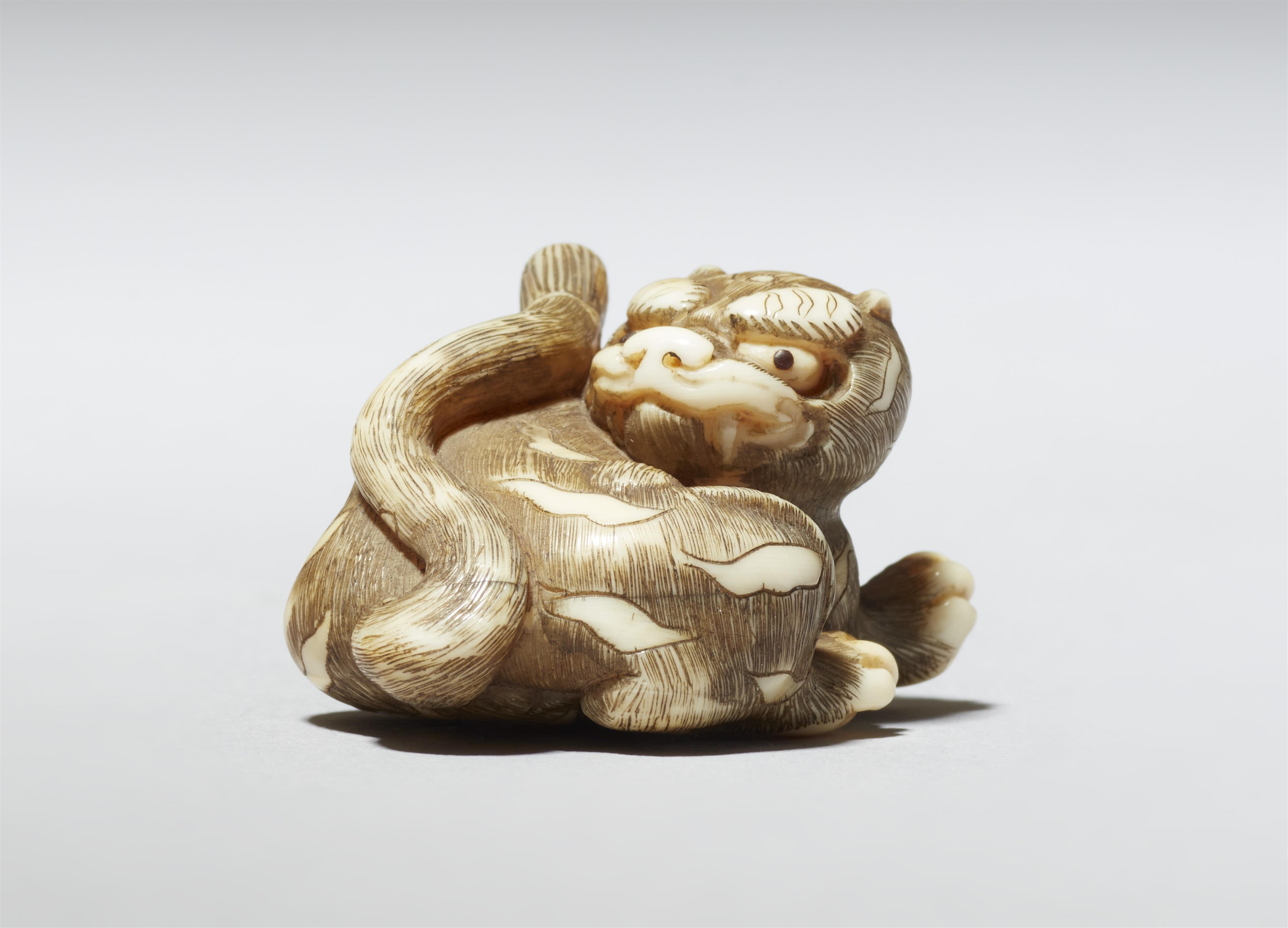 A small Kyoto ivory netsuke of a tiger. First half 19th century - image-2