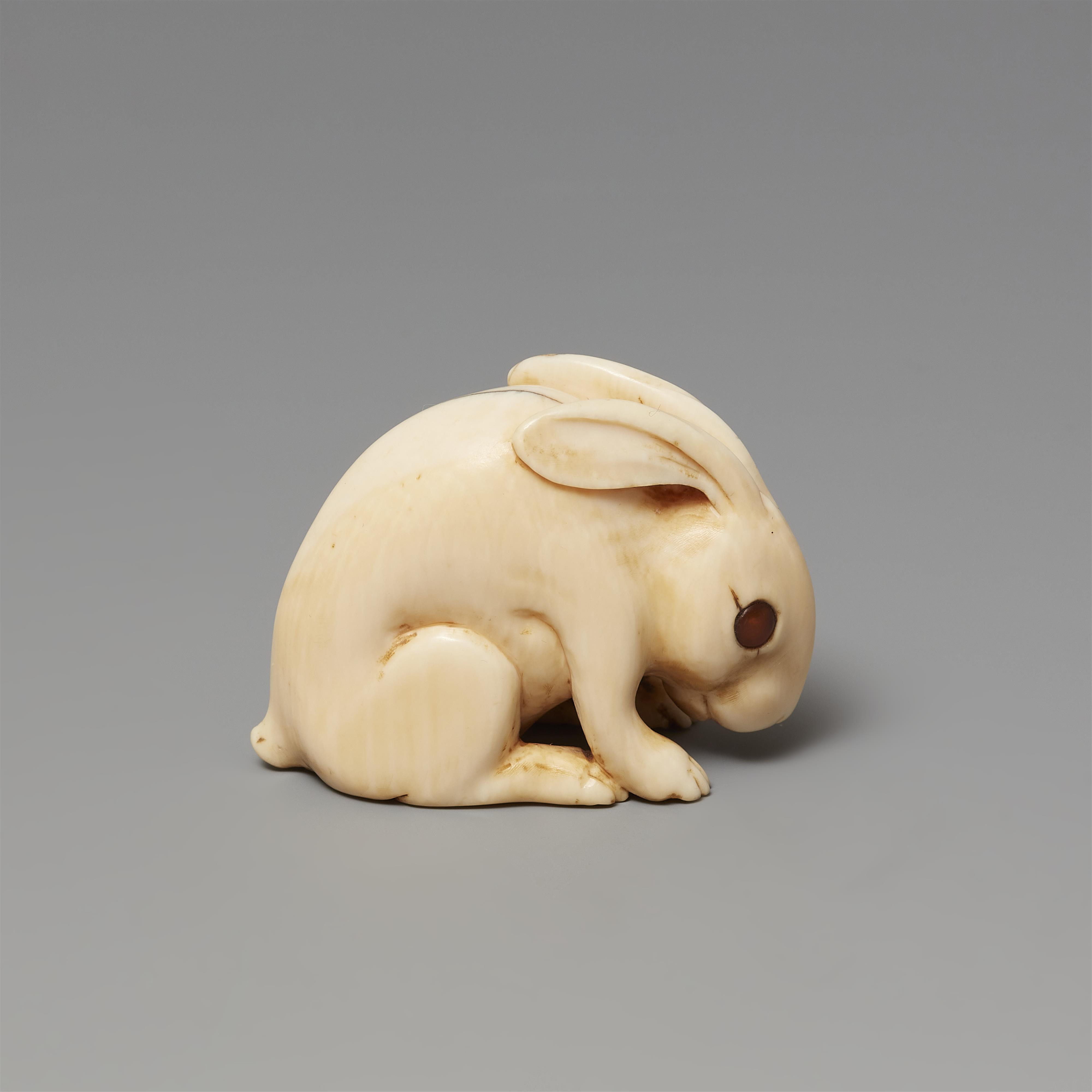 A large Kyoto ivory netsuke of a hare by Kiyotada. Early 19th century - image-2