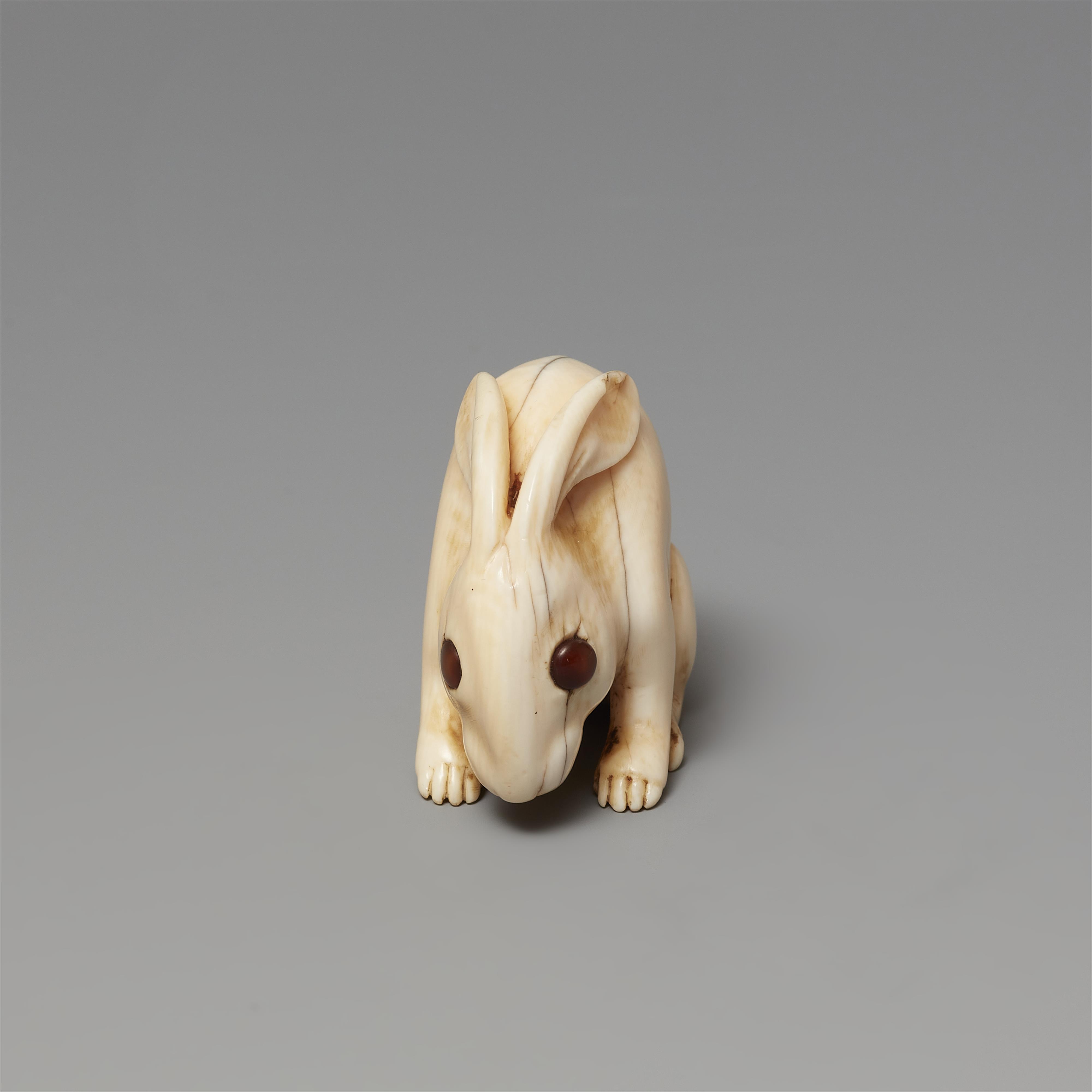 A large Kyoto ivory netsuke of a hare by Kiyotada. Early 19th century - image-3