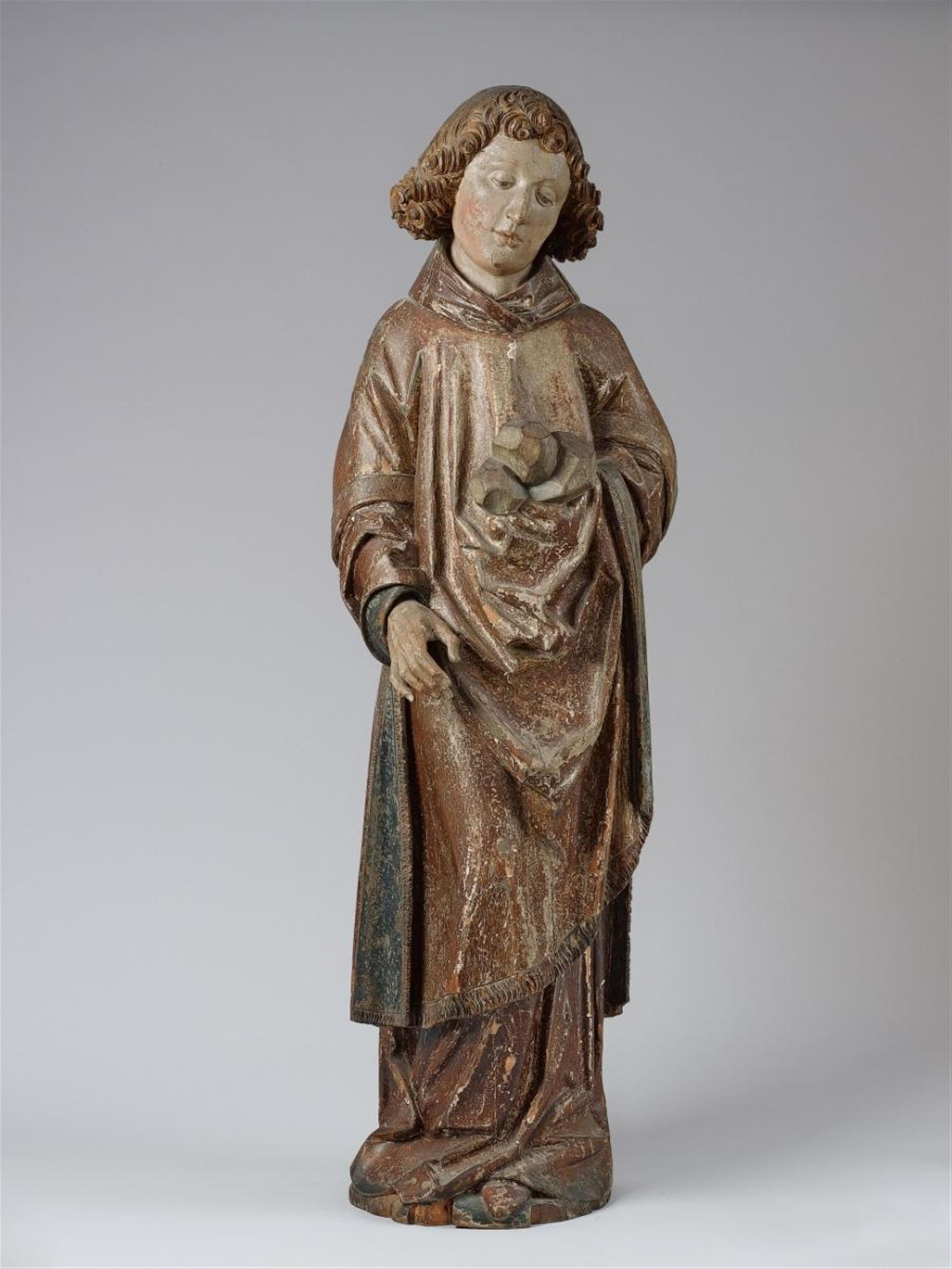 A high relief wood figure of SAINT STEPHEN - image-1