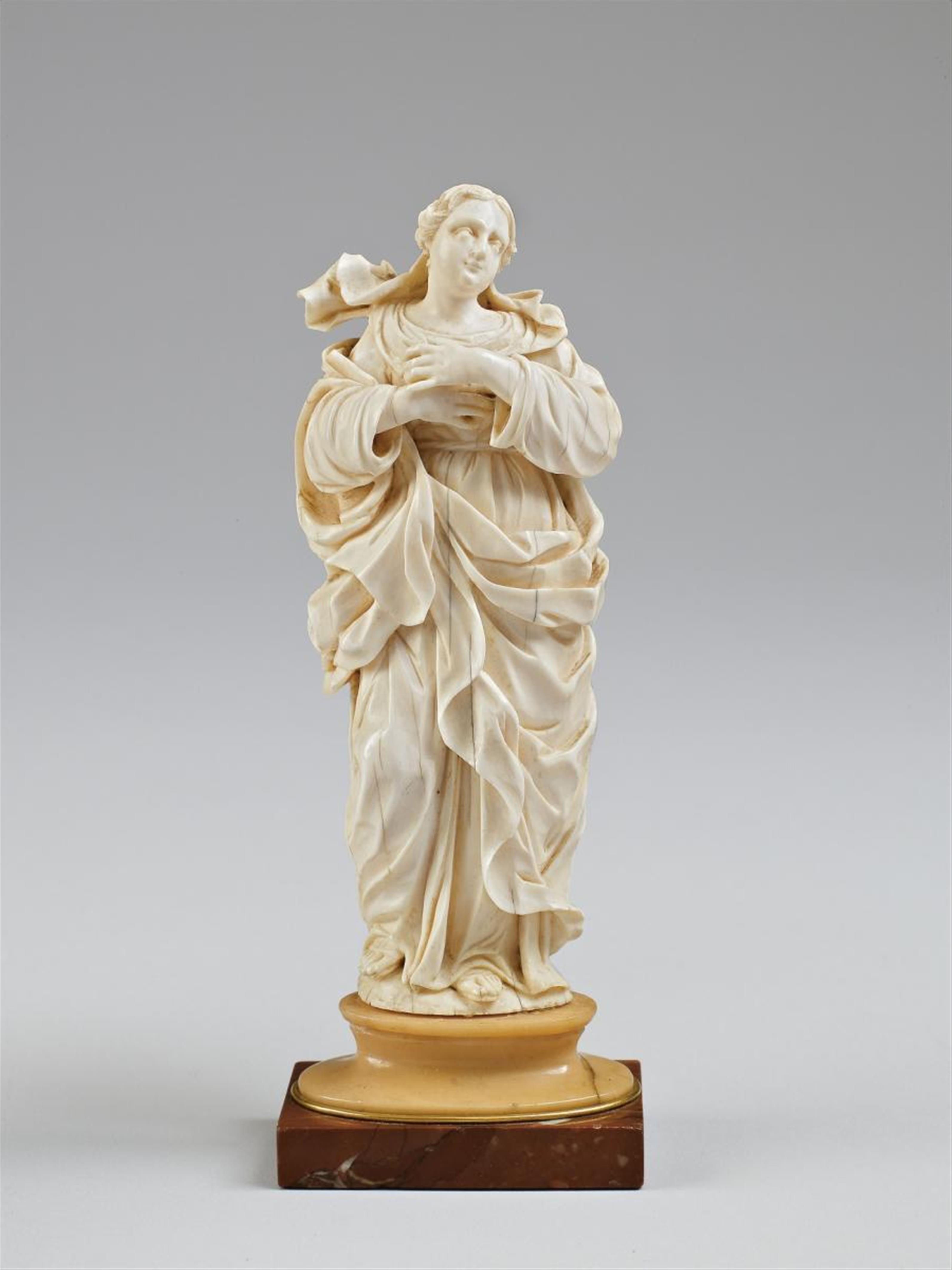 An ivory high-relief figure oF THE VIRGIN - image-1