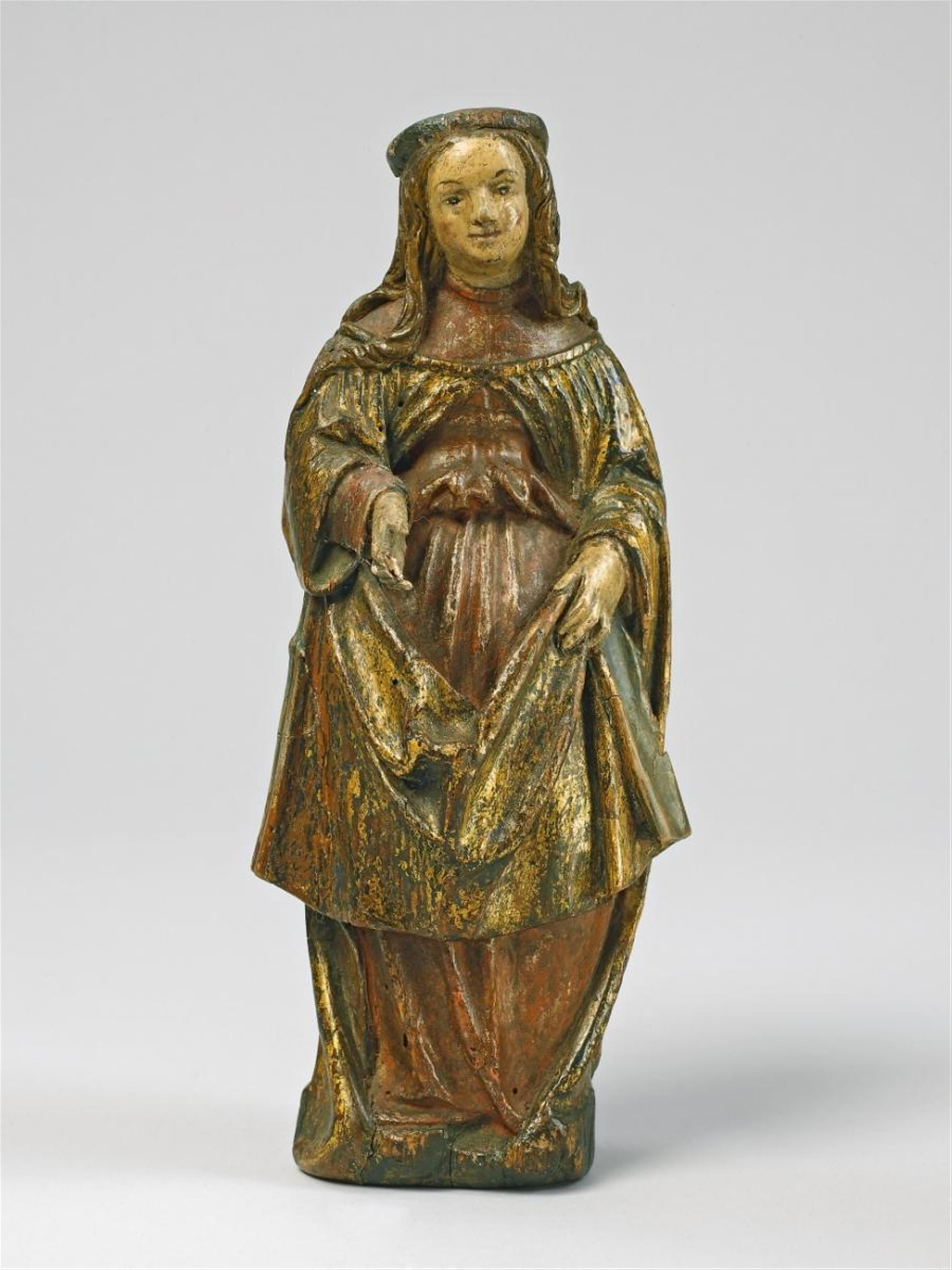 A carved and polychrome wood figure of A FEMALE SAINT - image-1