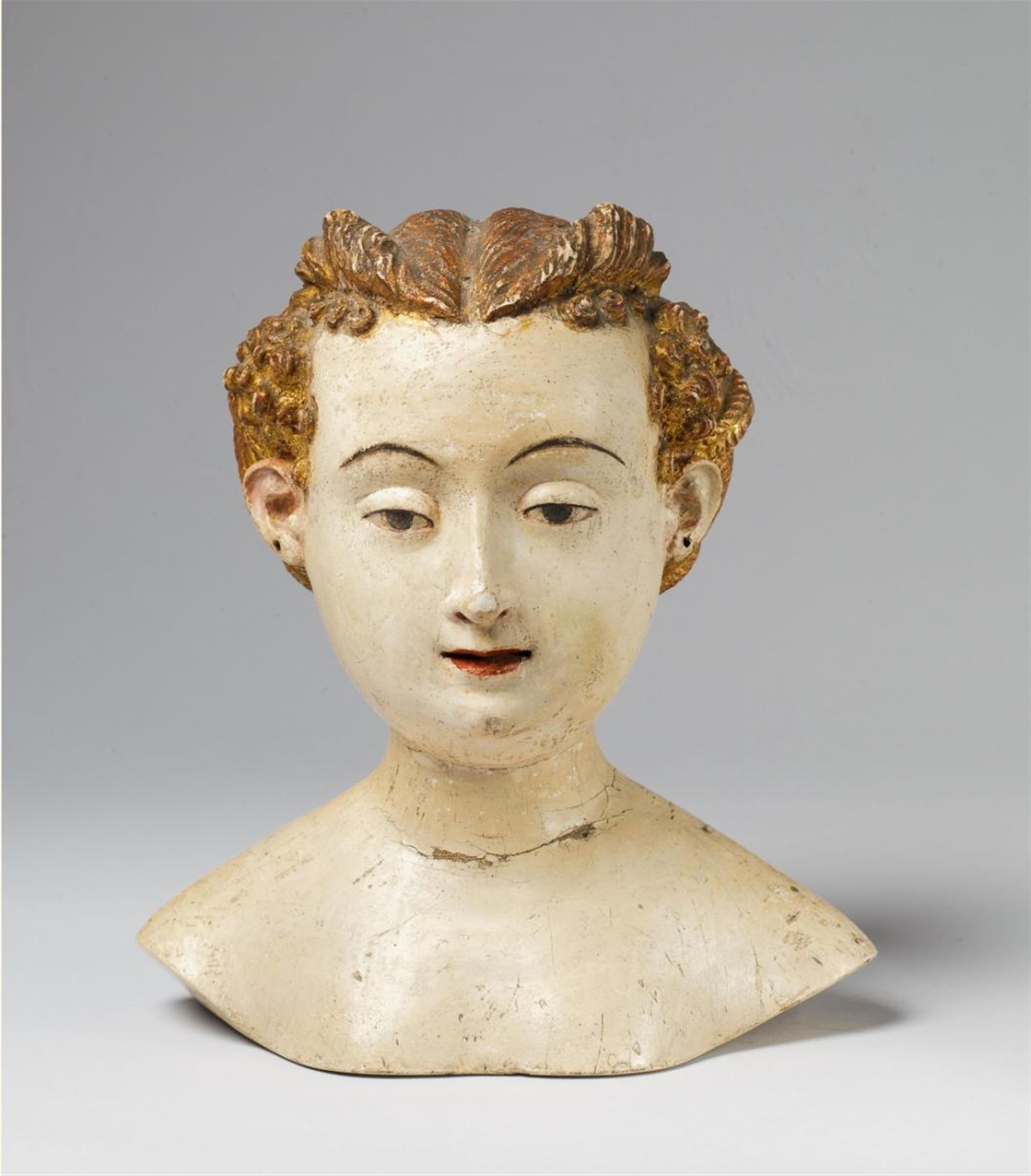 A wood bust of YOUNG FEMALE FIGURE - image-1