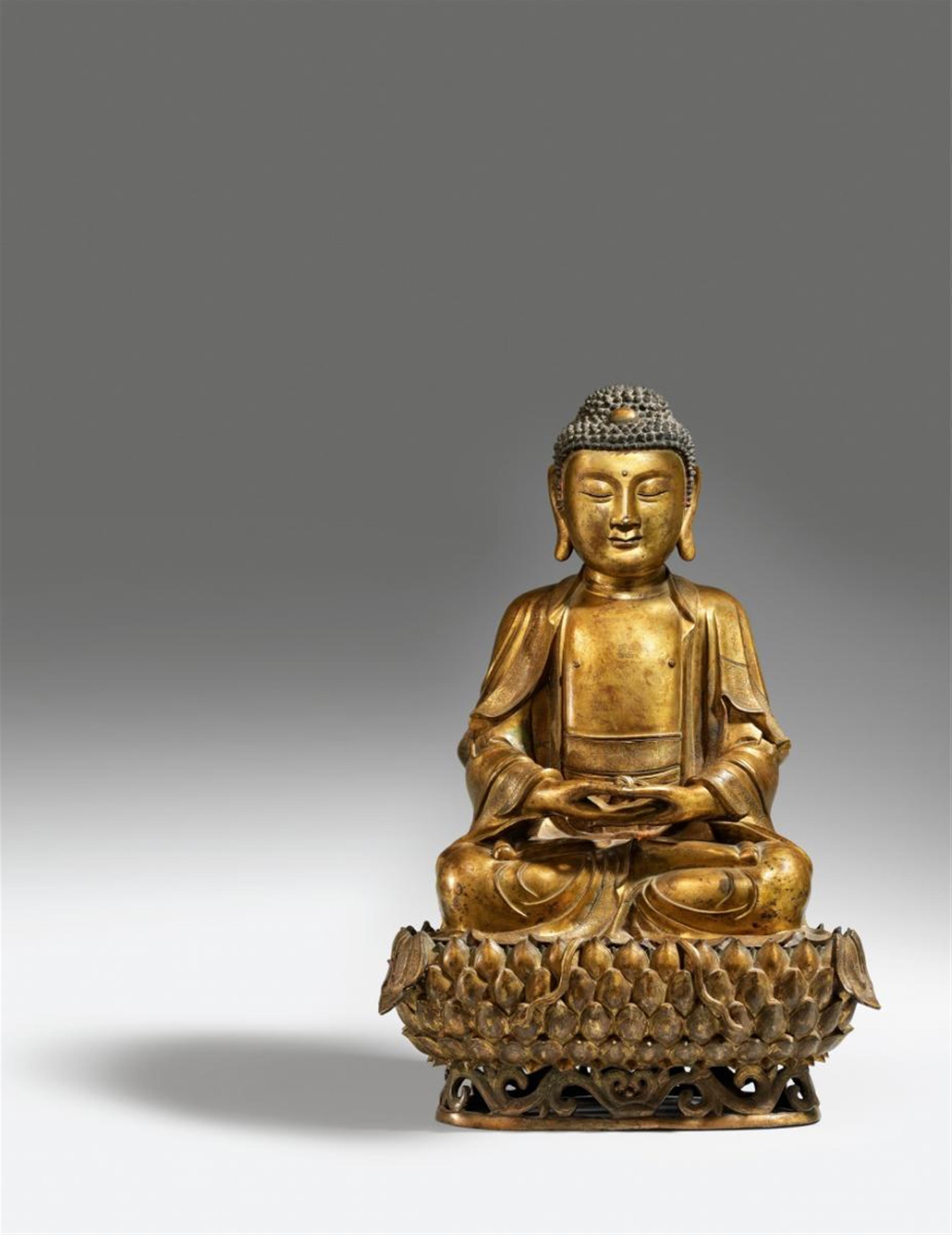 A large gilt-bronze figure of Buddha Shakyamuni. Ming dynasty, 17th ...
