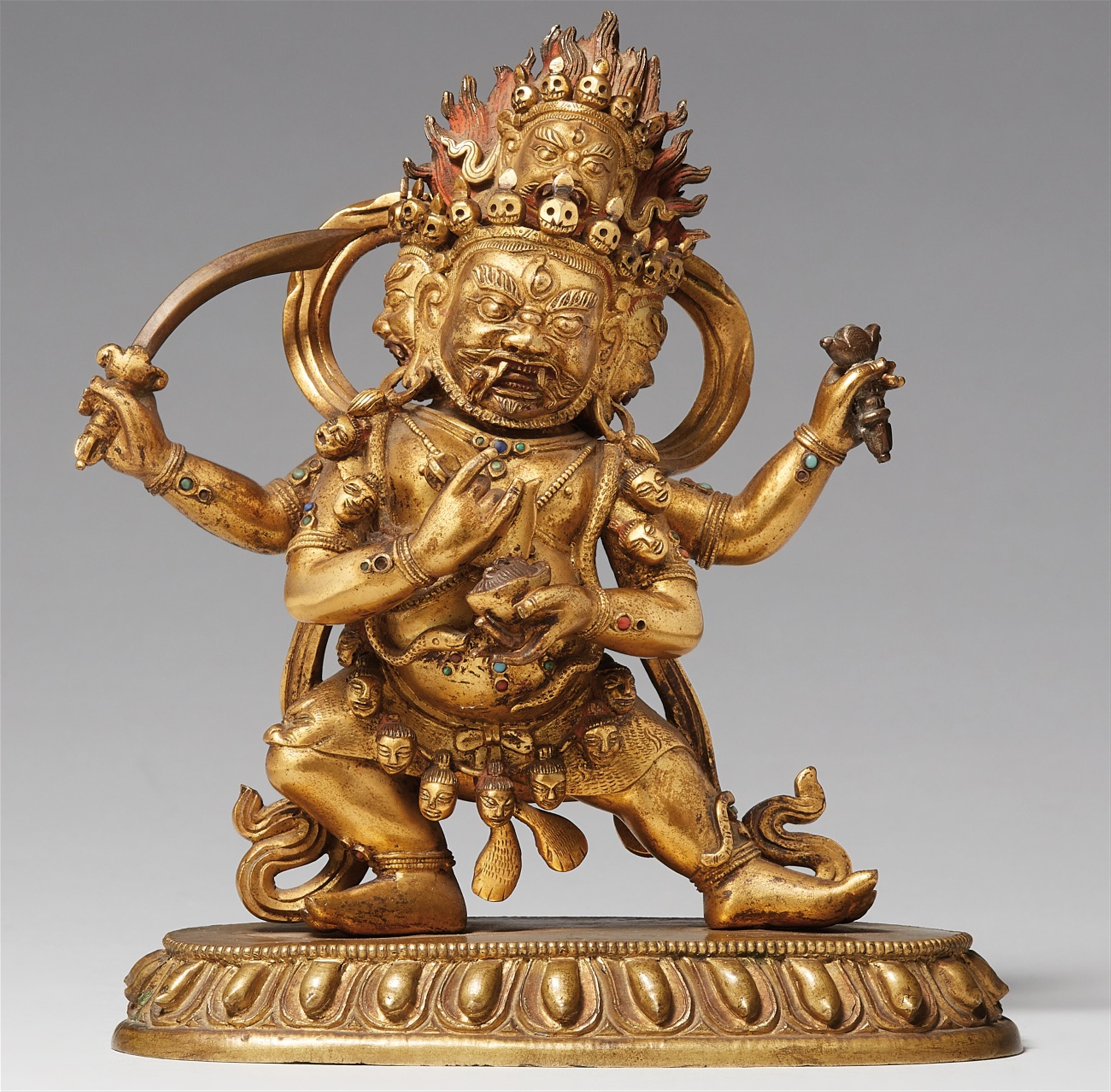 An expressive Sinotibetan gilt bronze figure of Chaturmukha Mahakala ...