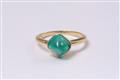 An 18k gold ring with an emerald cabochon. - image-3