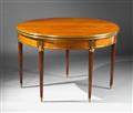 A Neoclassical brass-mounted mahogany convertible table. - image-2