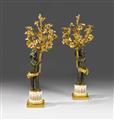 A pair of Parisian fire-gilt and burnished bronze candelabra. - image-2