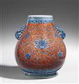 A blue and white hu-shaped vase with coral red ground. 20th century - image-2