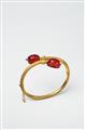 An 18k gold and carnelian scarab Antique revival bangle - image-1