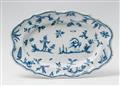 An oval Alcora faience dish with blue "grotteschi" decor - image-2