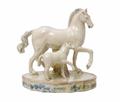A Continental white-glazed faience model of a unicorn and foal - image-1