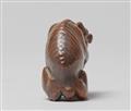 A large boxwood netsuke of a hungry wolf. Early 19th century - image-3